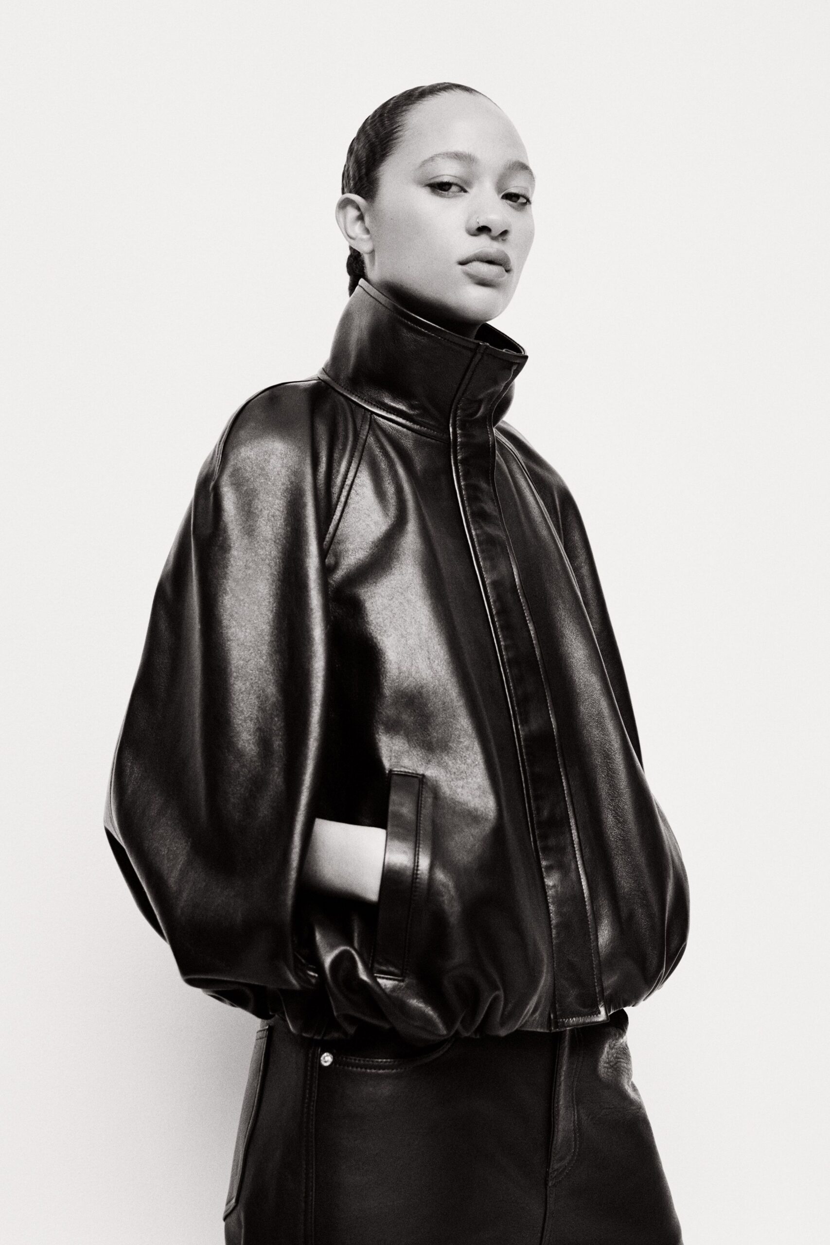 black leather long-sleeve collared relaxed zippered jacket