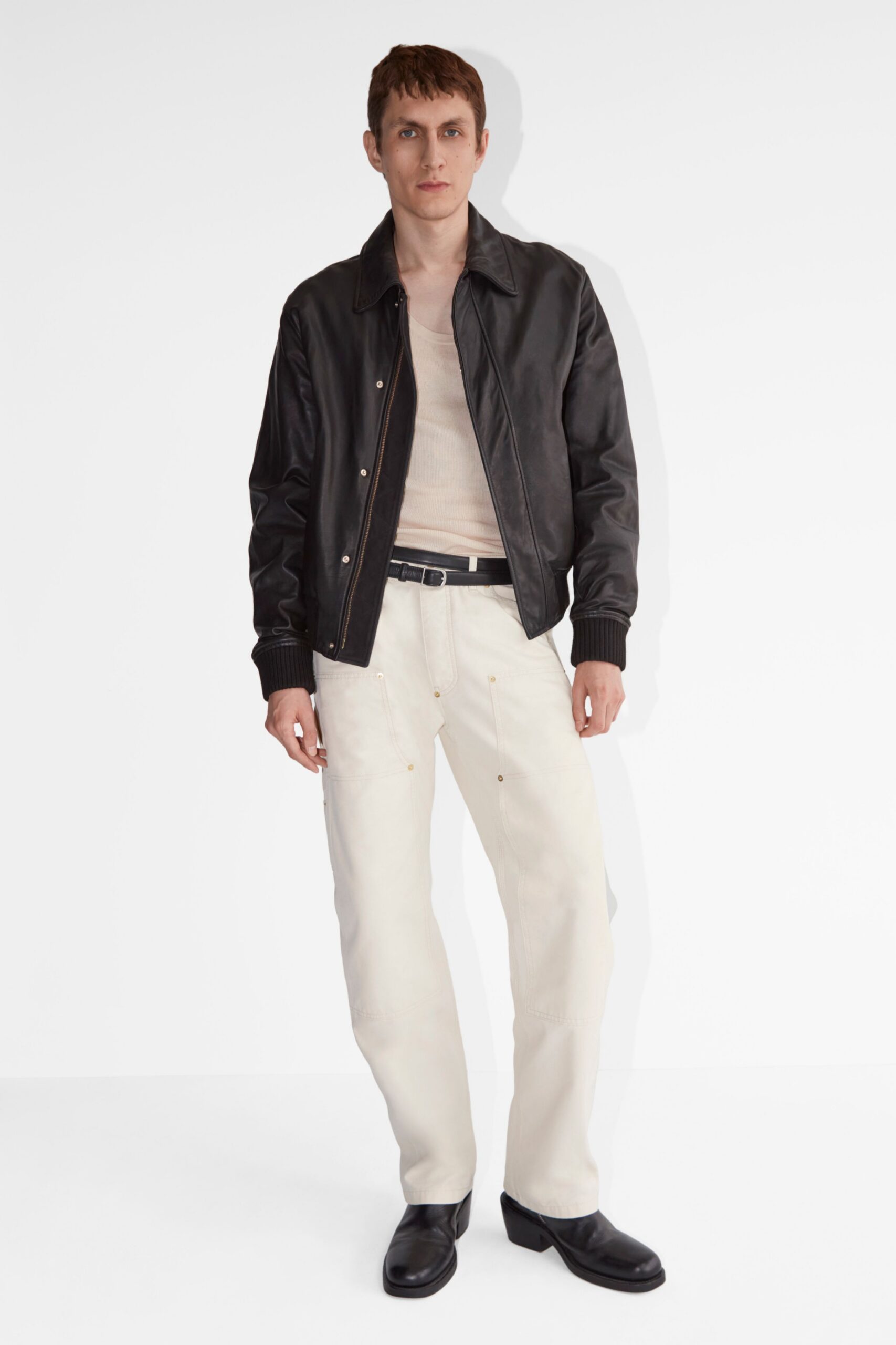 black leather long-sleeve collared fitted jacket