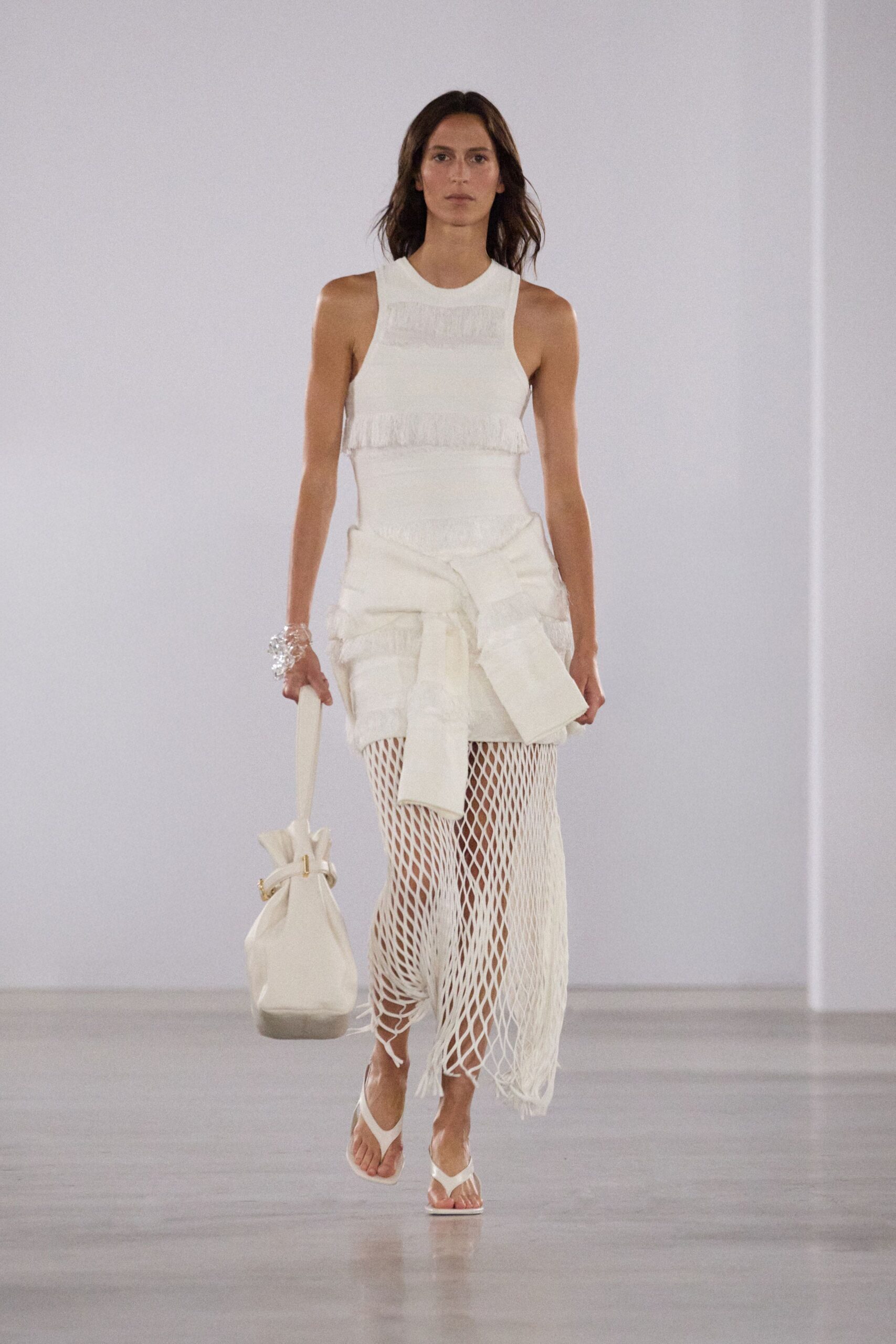 white cotton sleeveless high-neck fitted ruffled top