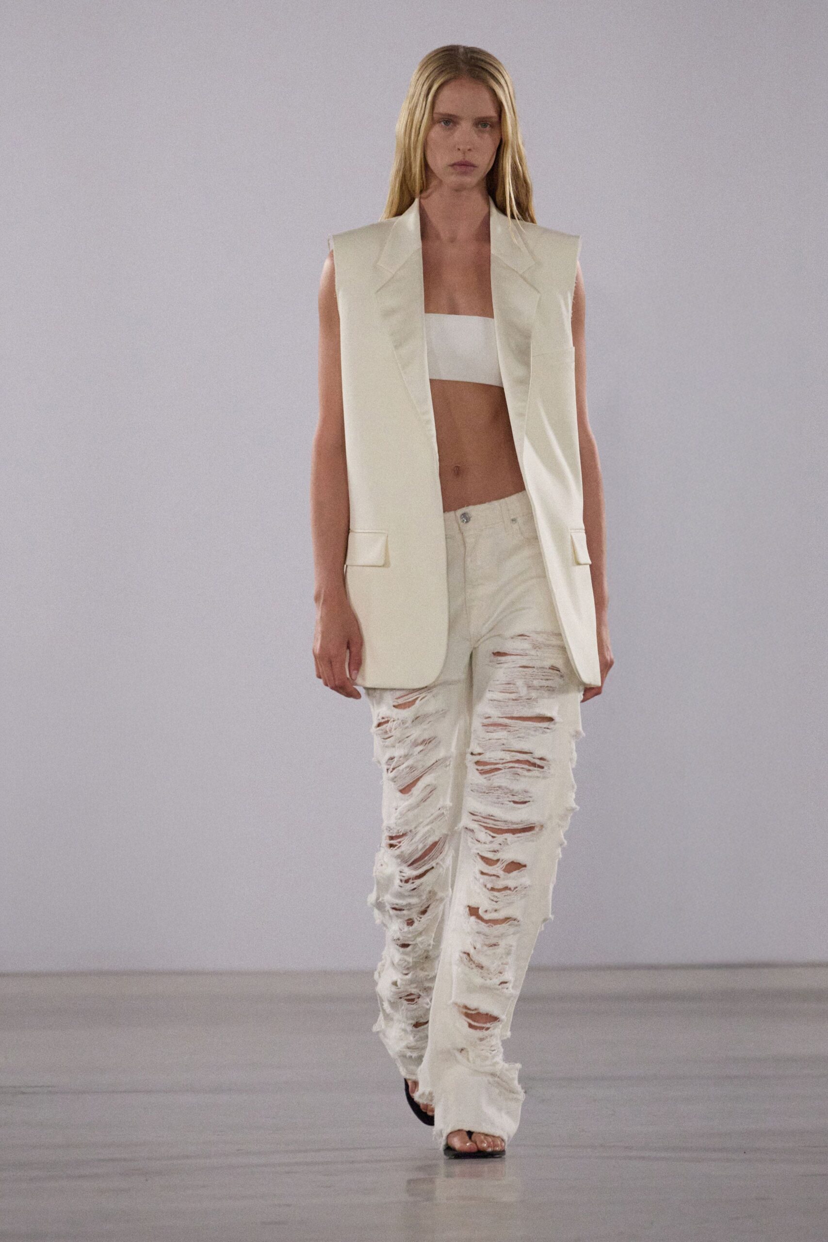 white sleeveless fitted crop-top