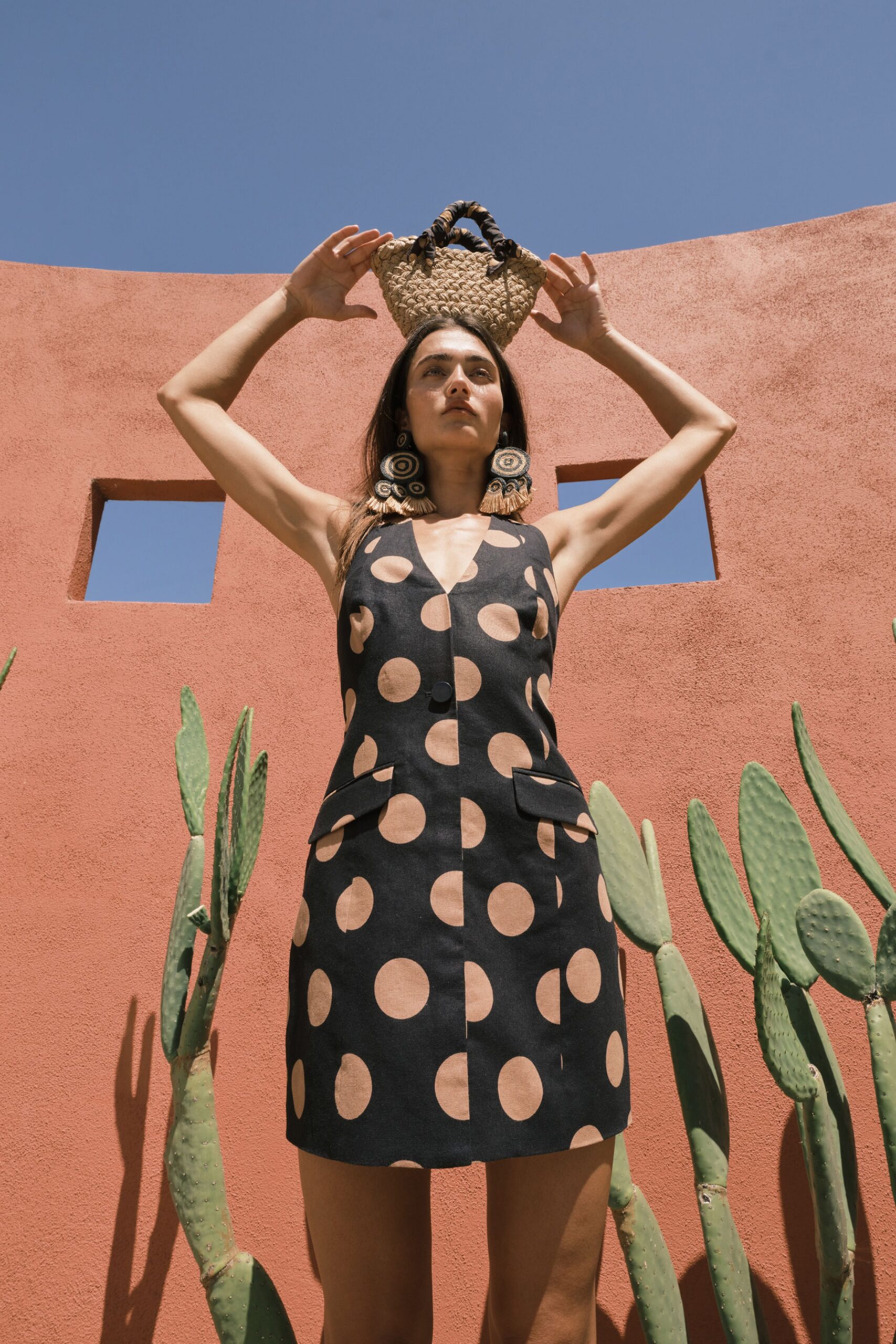 black cotton sleeveless v-neck fitted polka-dot pockets dress