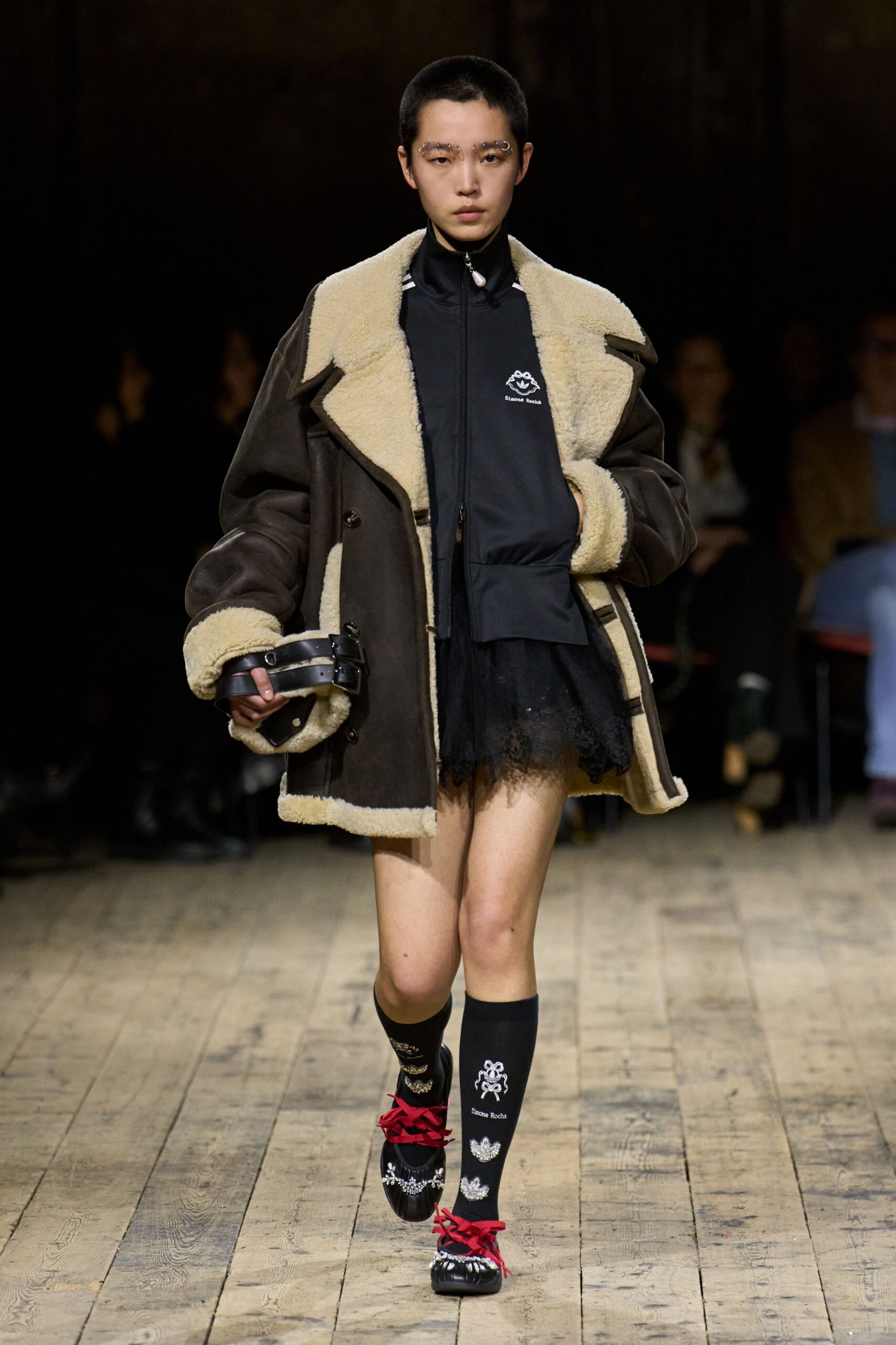 brown leather coat with black tulle skirt