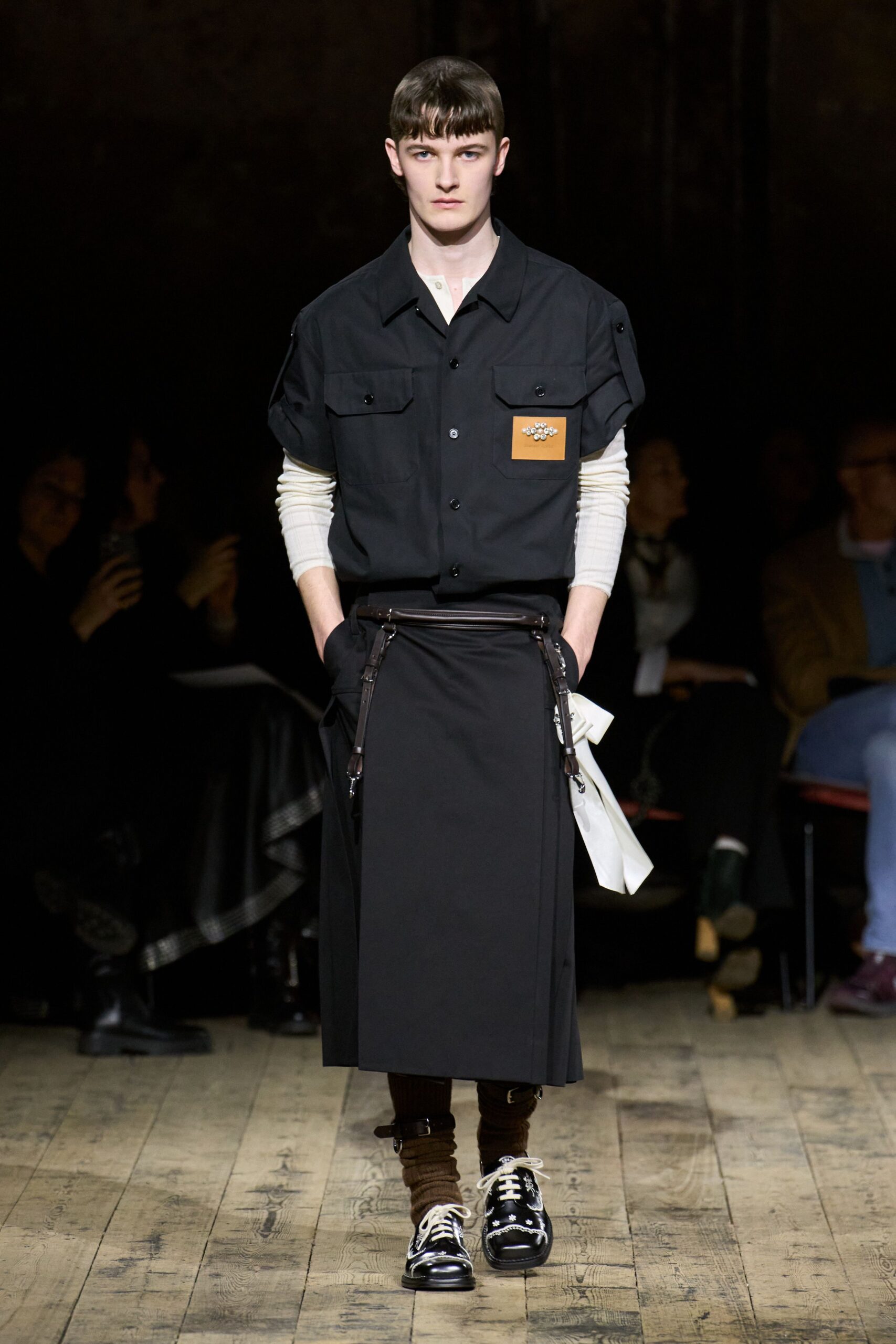 black relaxed shirt and fitted skirt