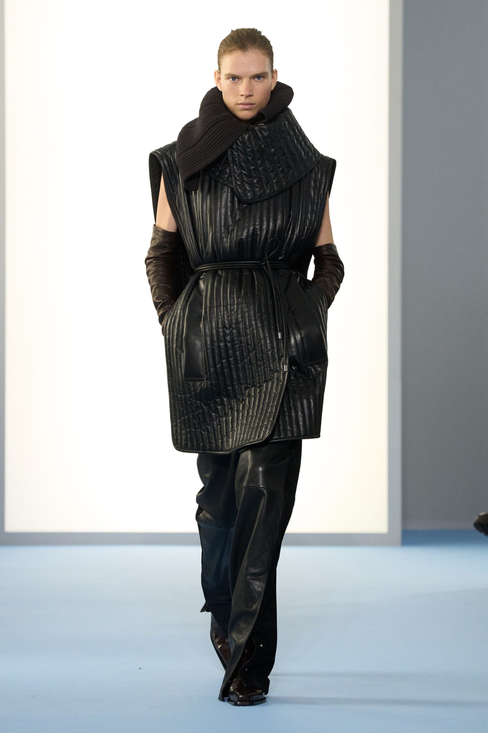black leather long-sleeve collared fitted quilted belted coat