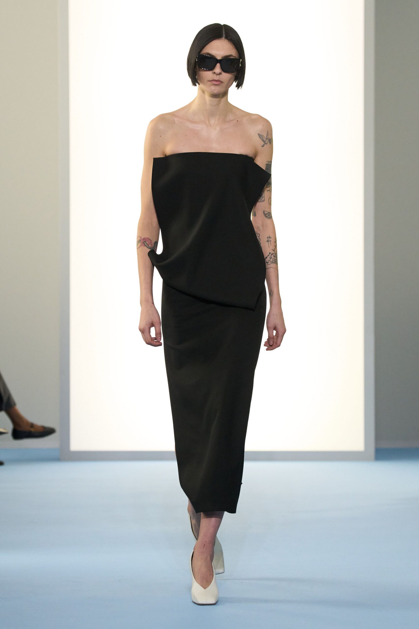 black silk strapless fitted draped midi dress