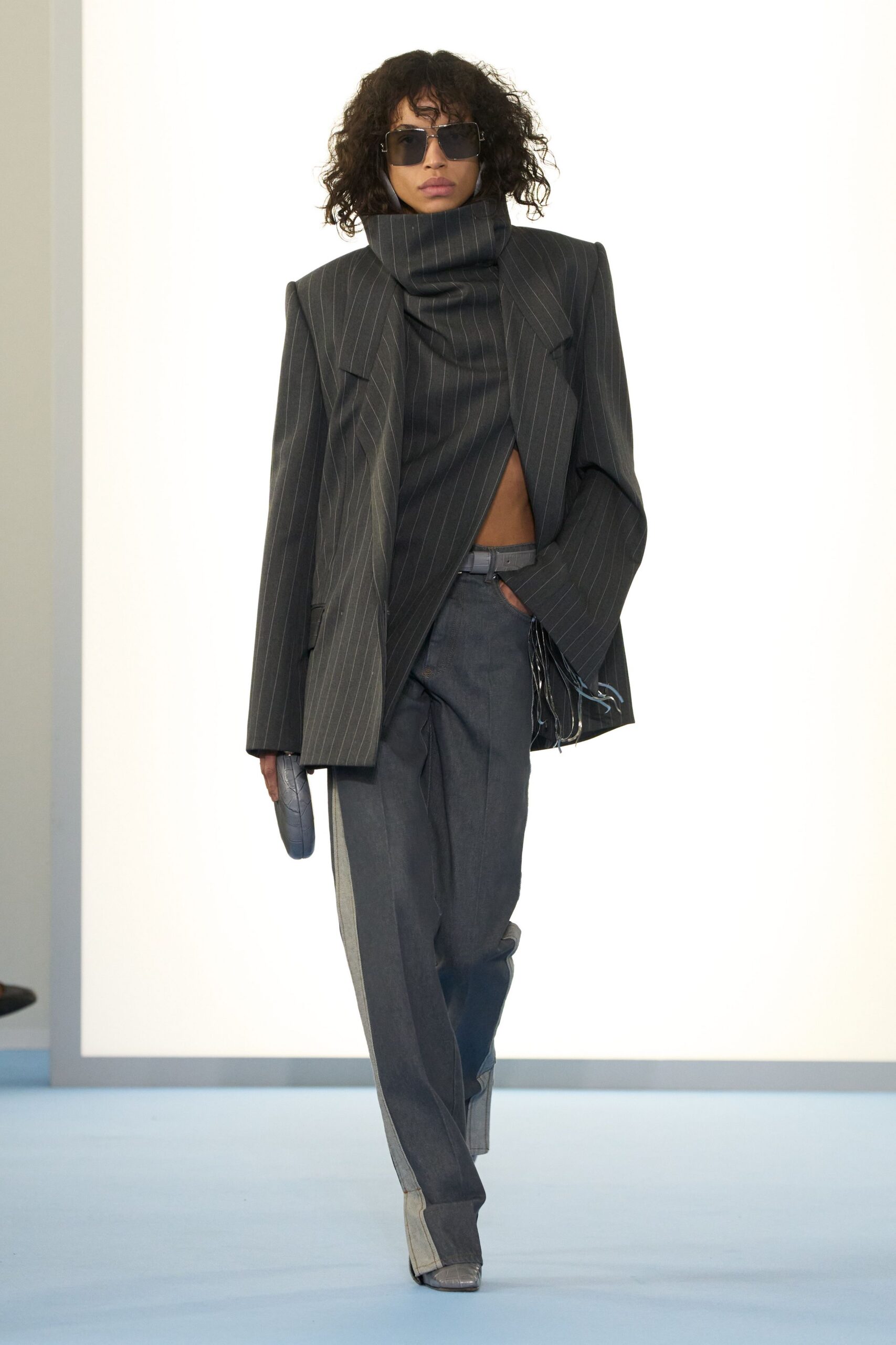 gray pinstriped blazer and tailored pants