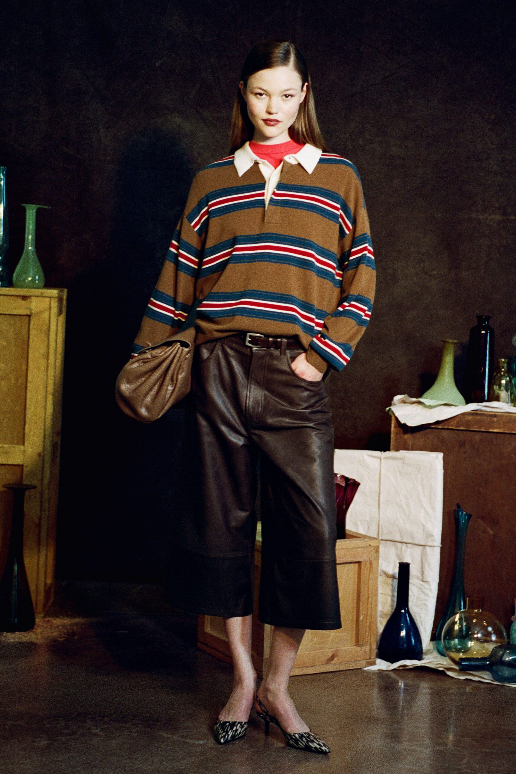striped shirt with leather pants