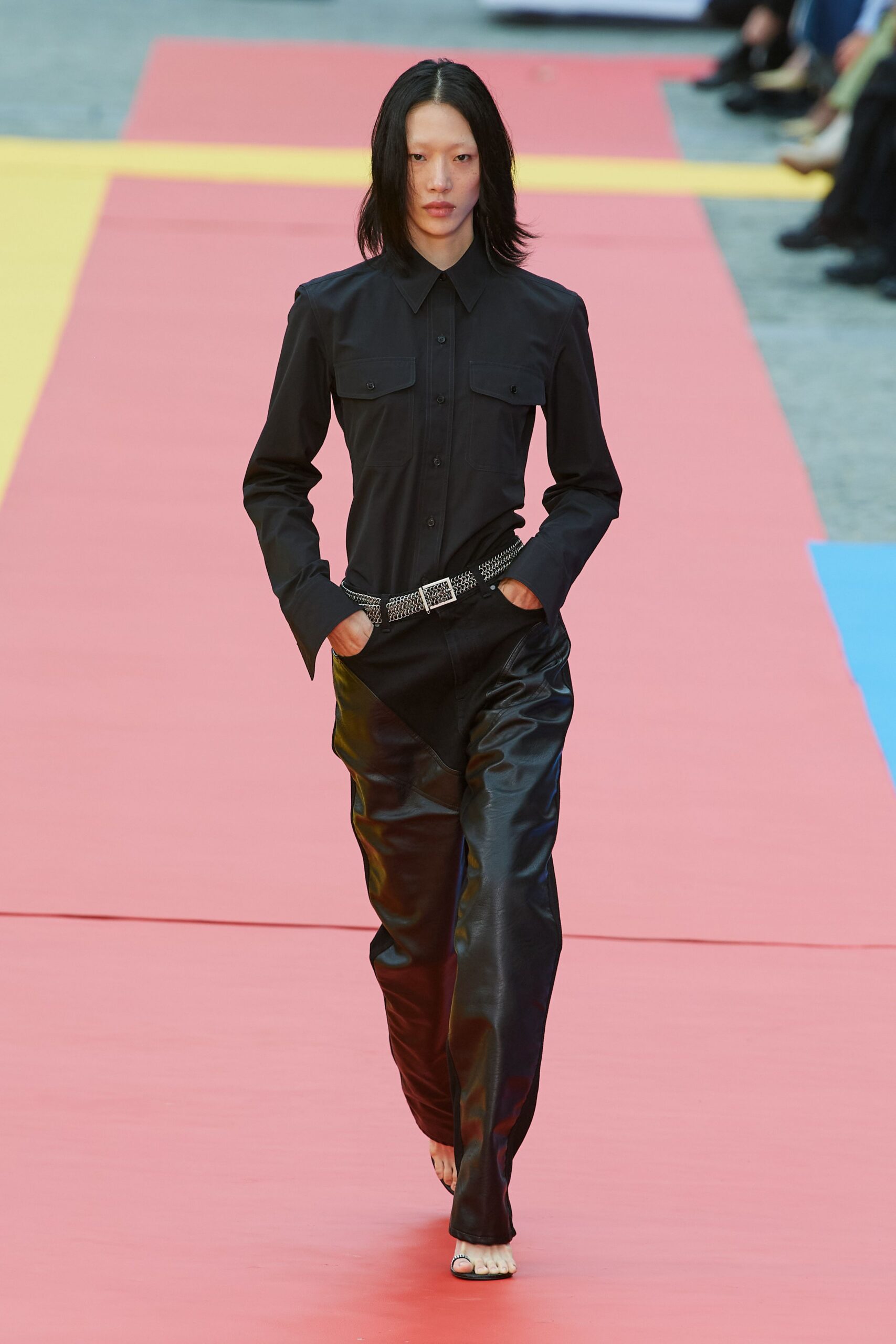 black shirt and leather pants