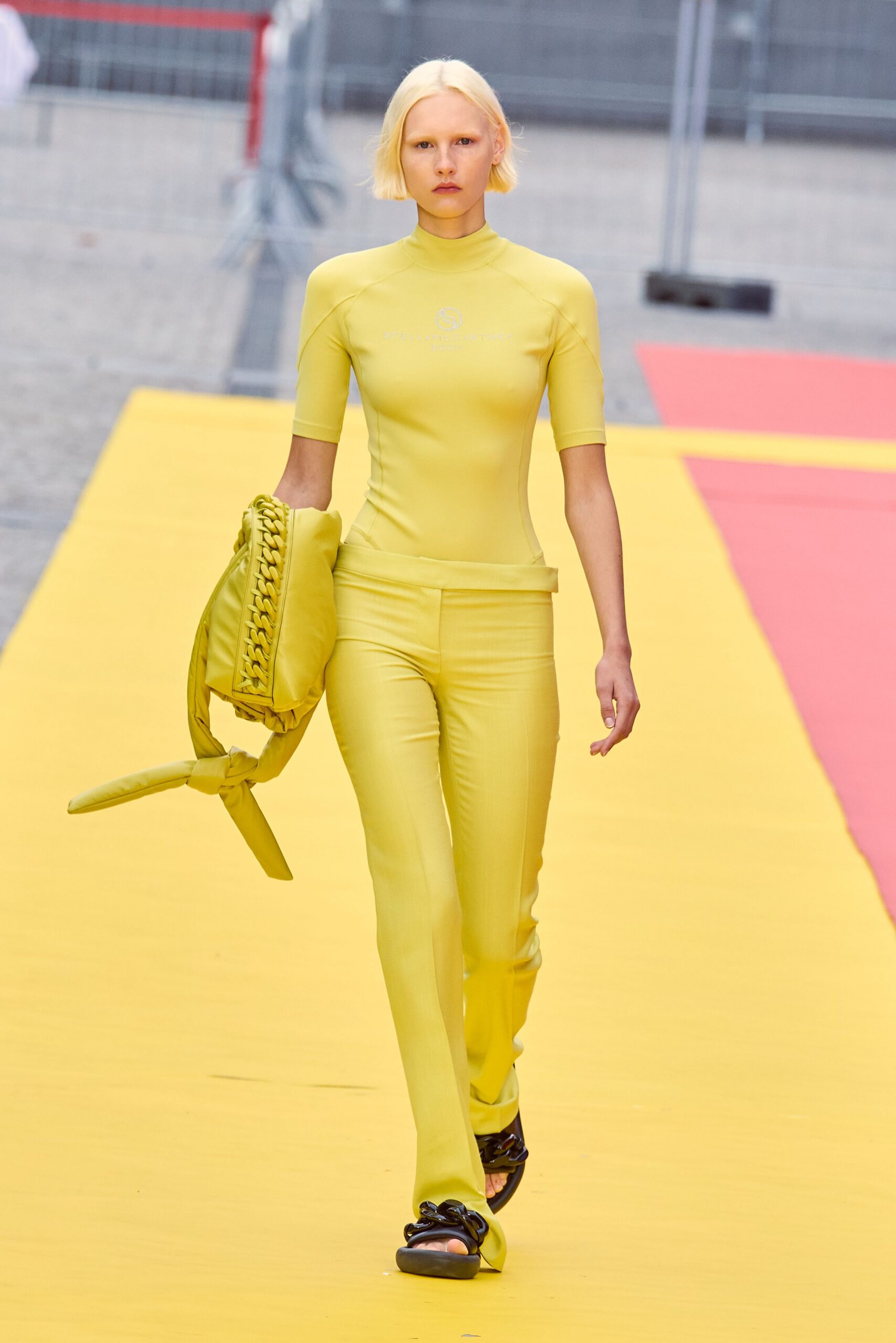yellow neoprene short-sleeve high-neck fitted catsuit
