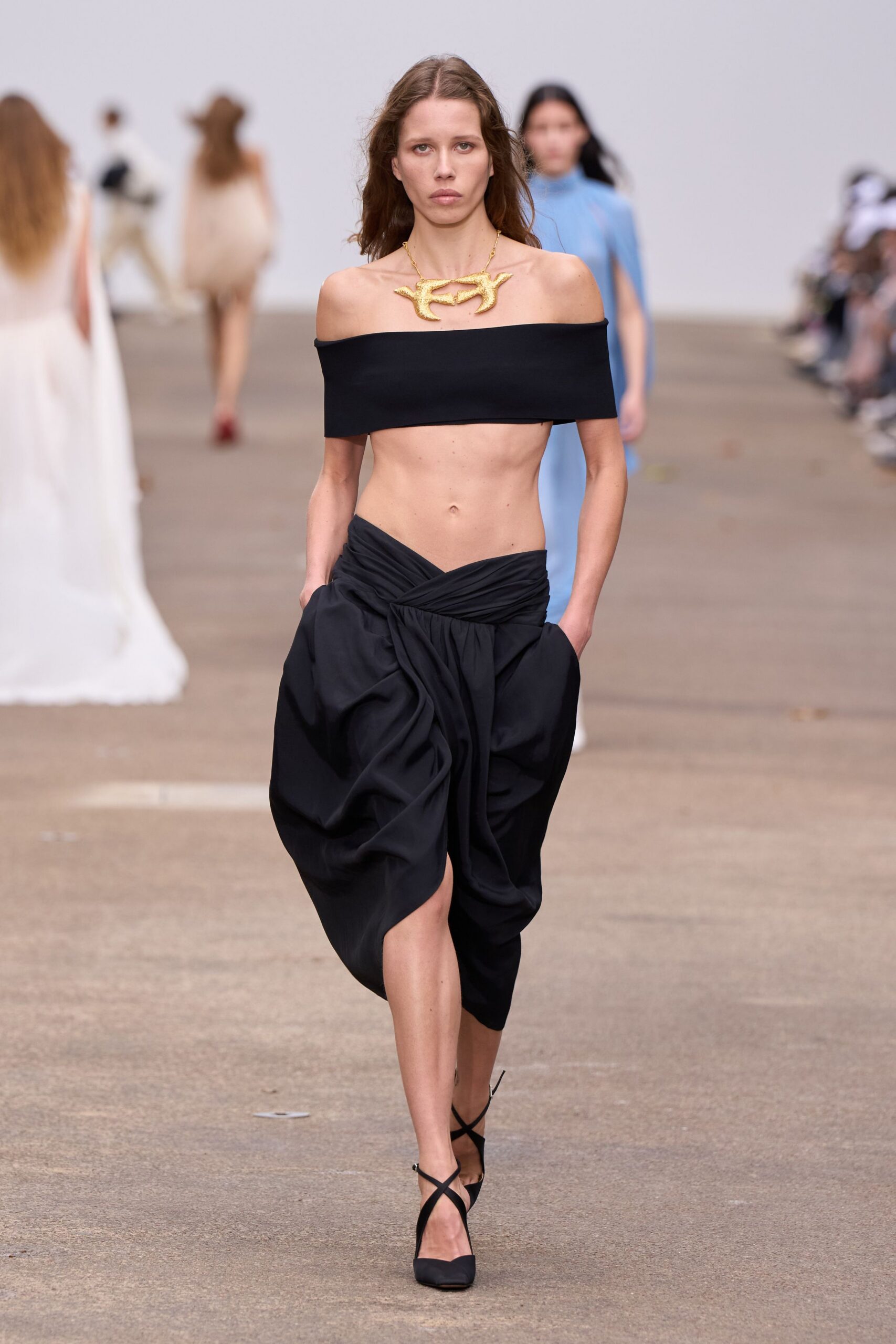 black asymmetric fitted high-waisted pleated skirt