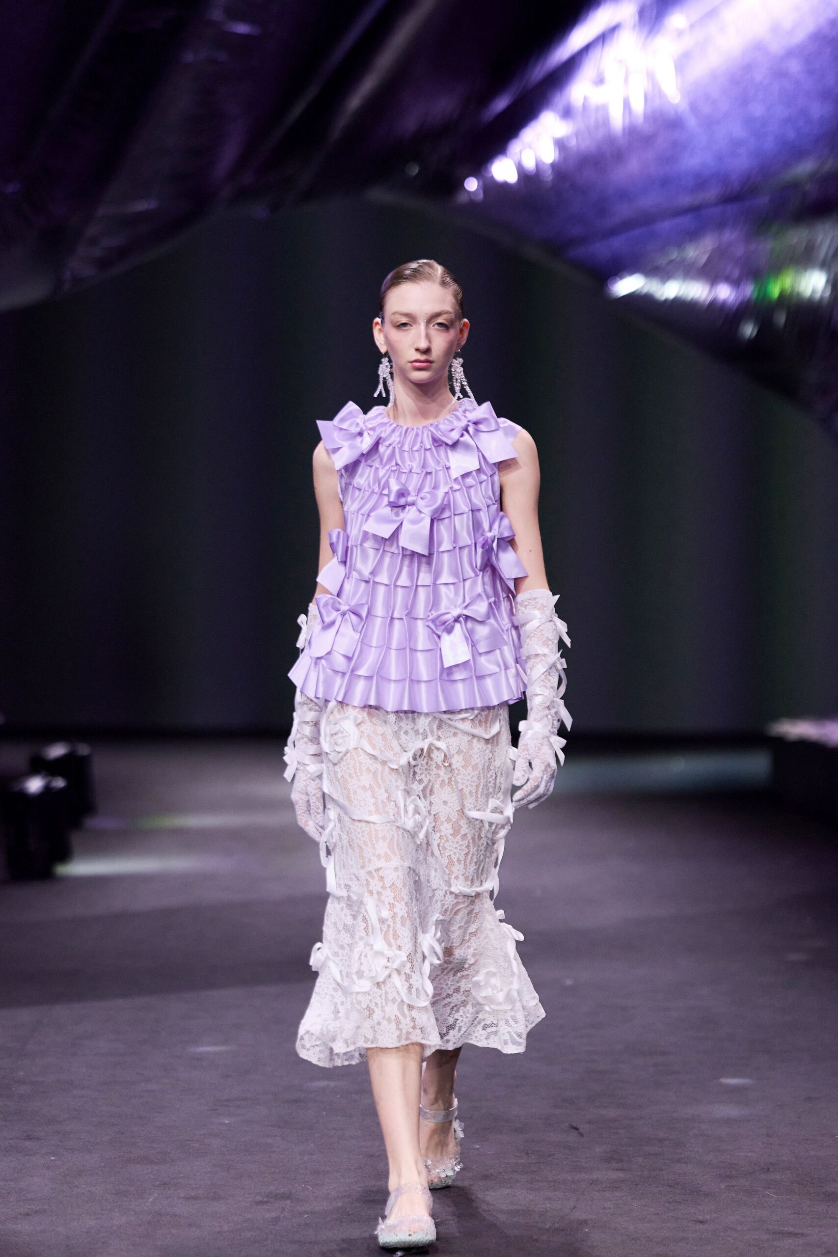 purple ruffled top with lace skirt