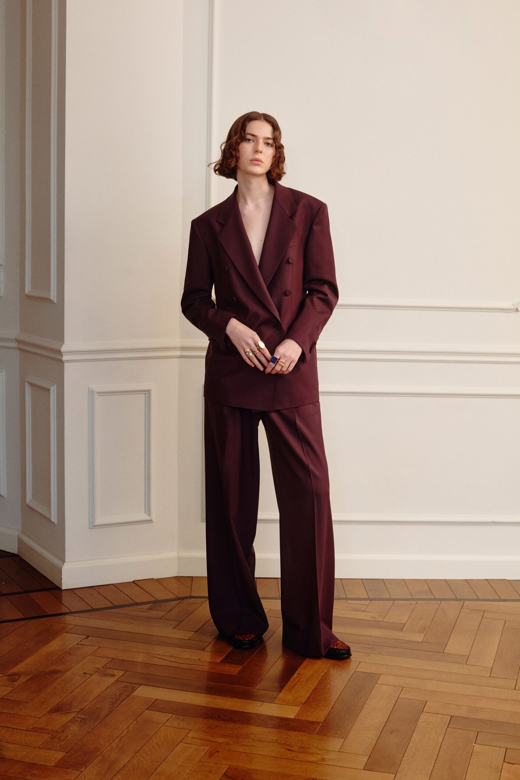 maroon long-sleeve collared tailored buttoned suit
