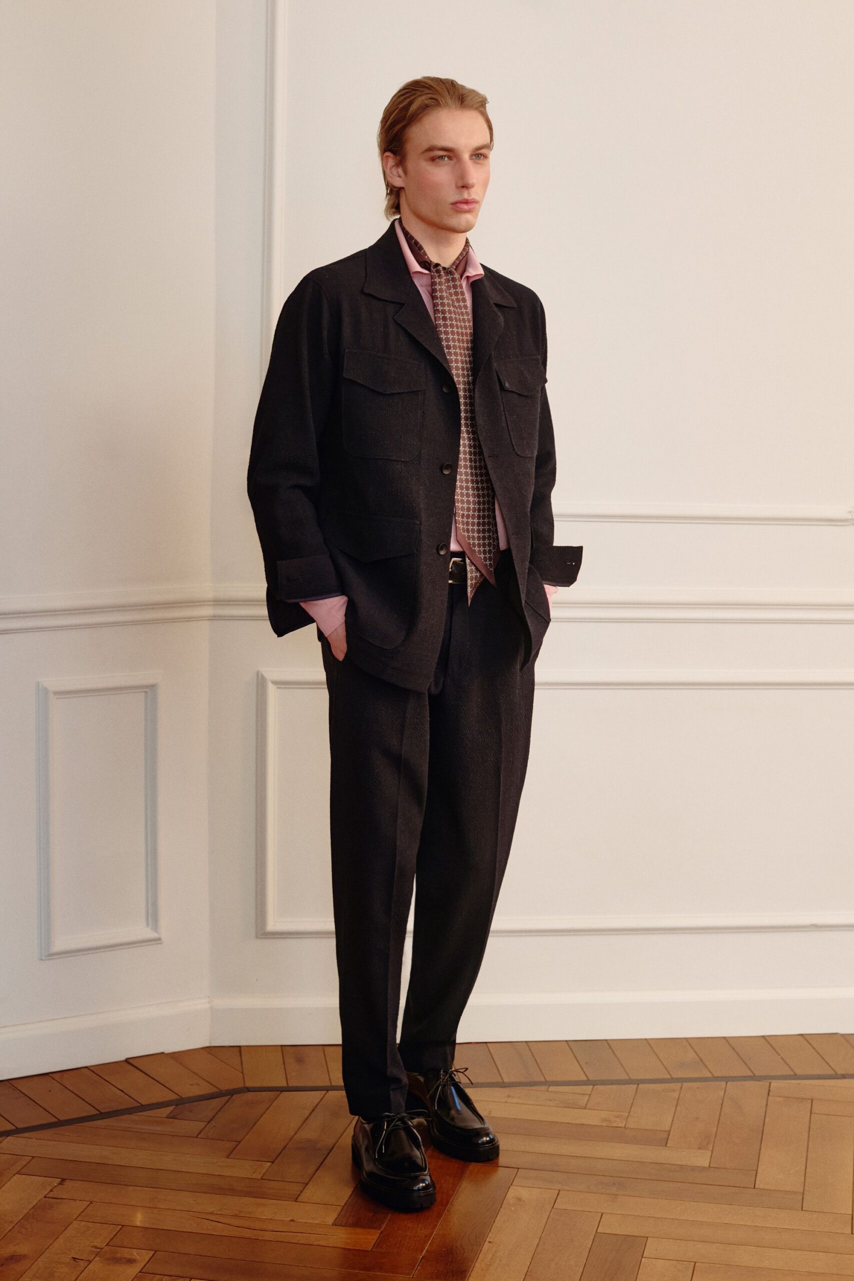black wool long-sleeve collared structured buttoned pockets jacket