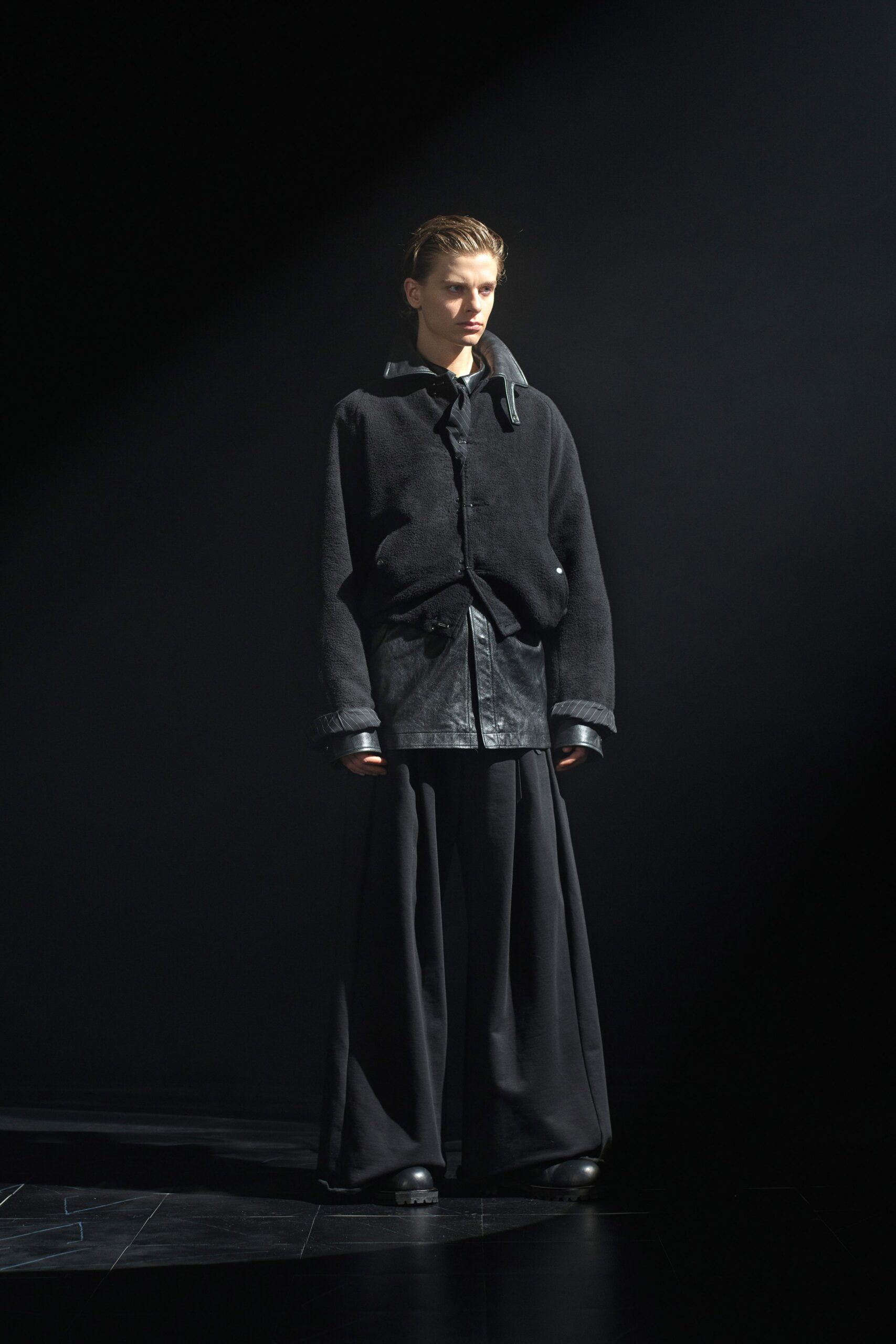 black oversized jacket with leather shirt