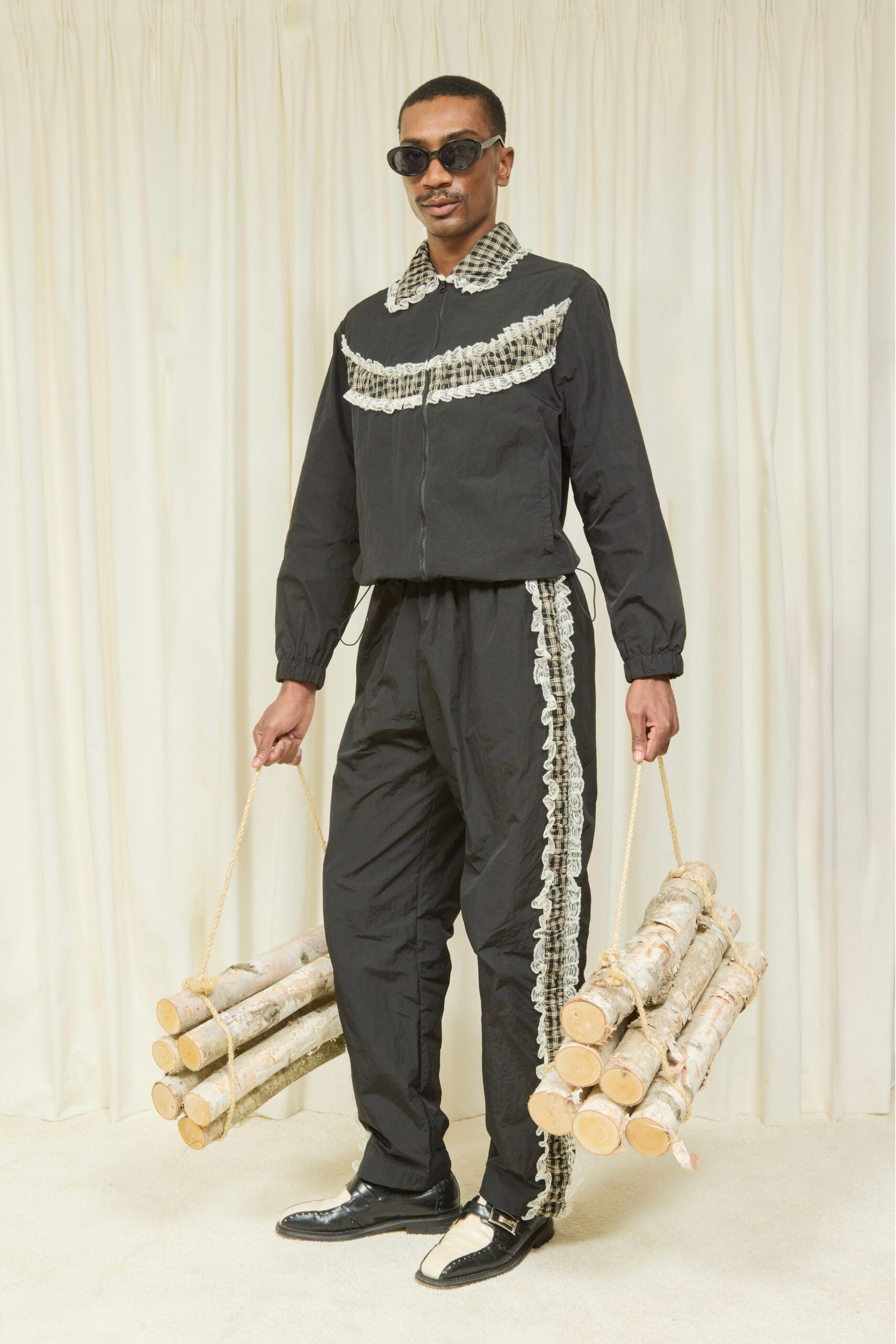 black cotton long-sleeve collared fitted ruffled jacket