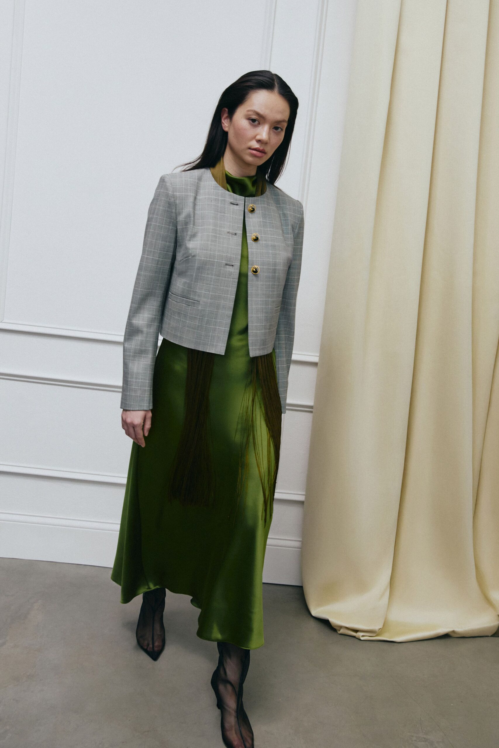 green silk long-sleeve collared fitted straight-leg flowing dress