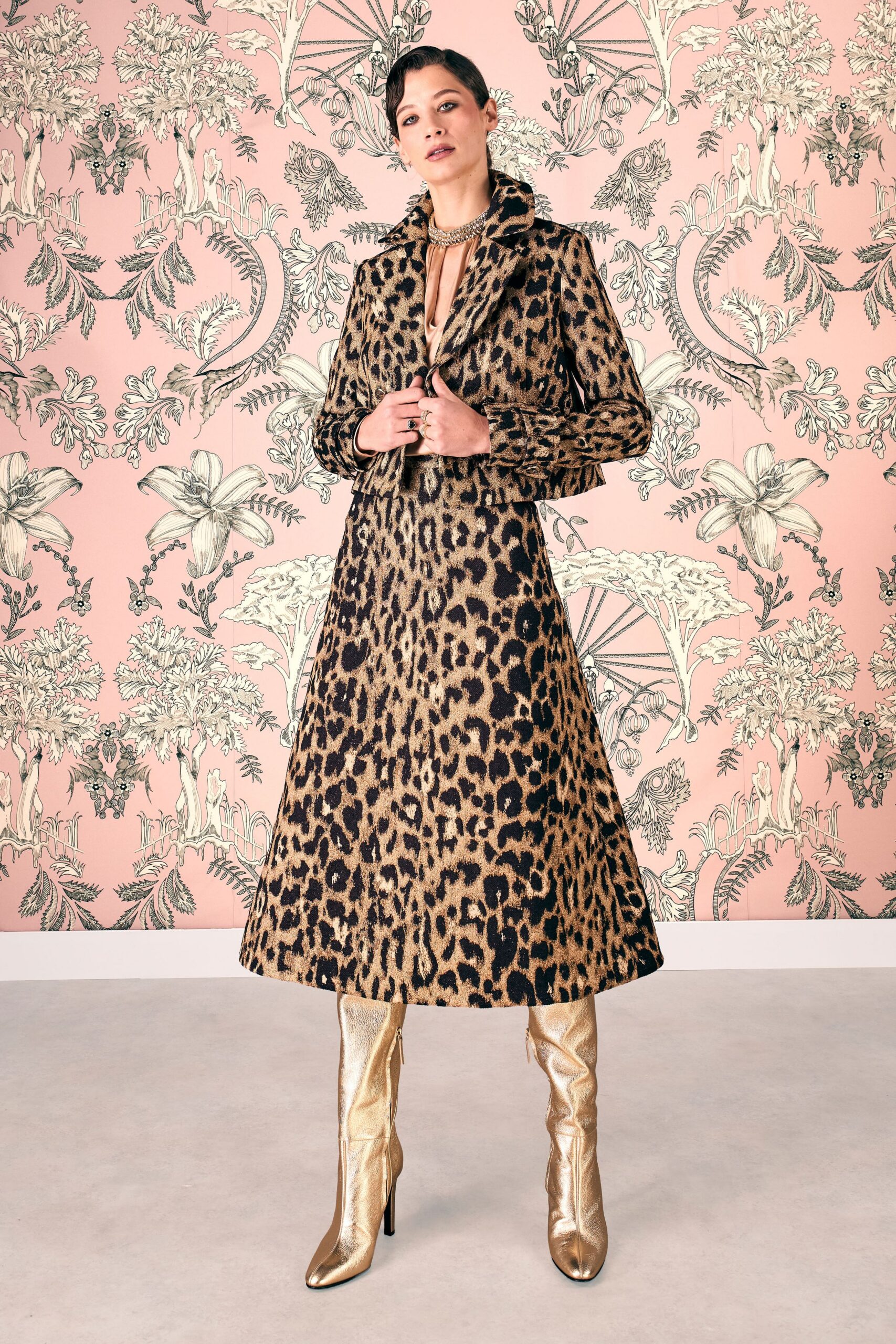brown animal-print maxi coat with gold boots