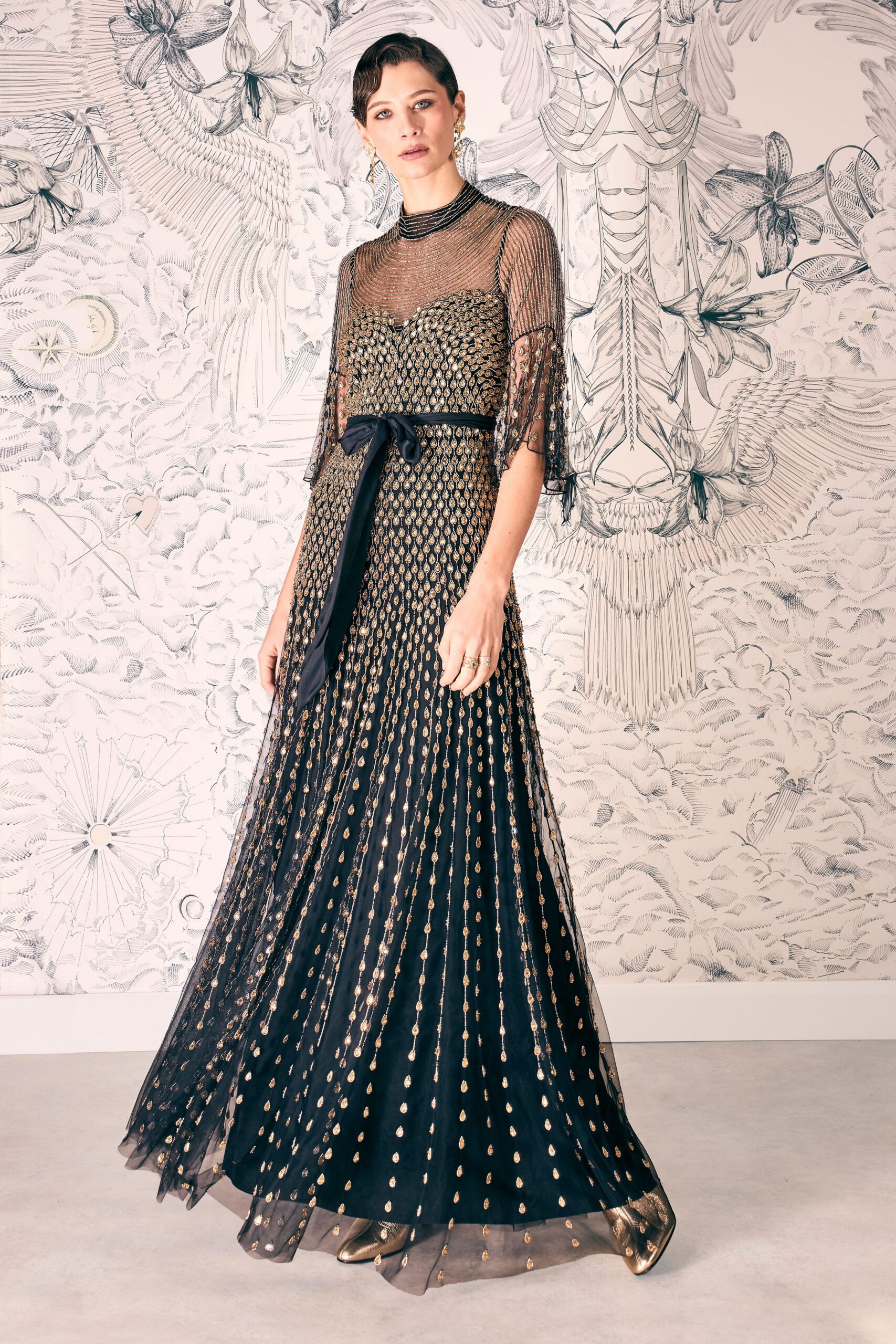 black and gold pleated gown