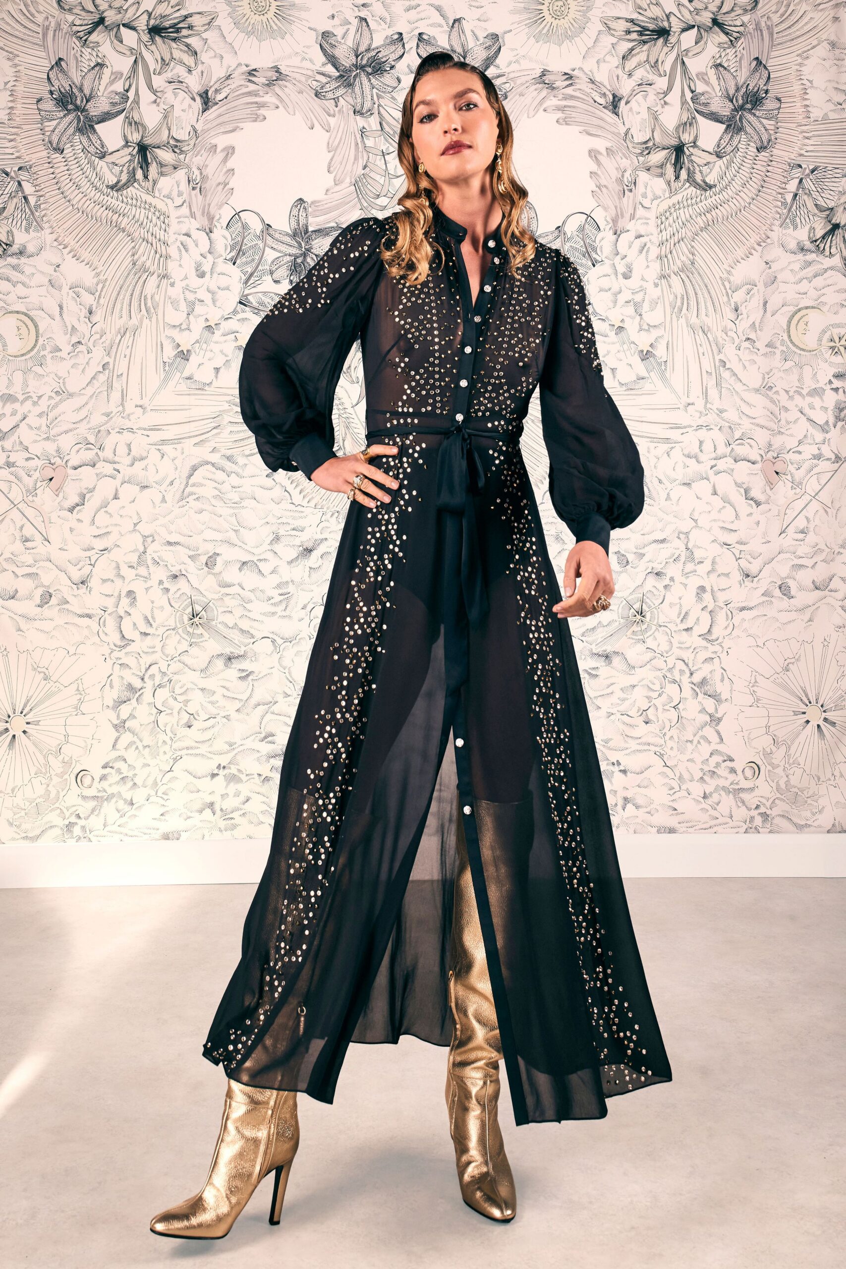 black sheer embroidered maxi dress with gold heels