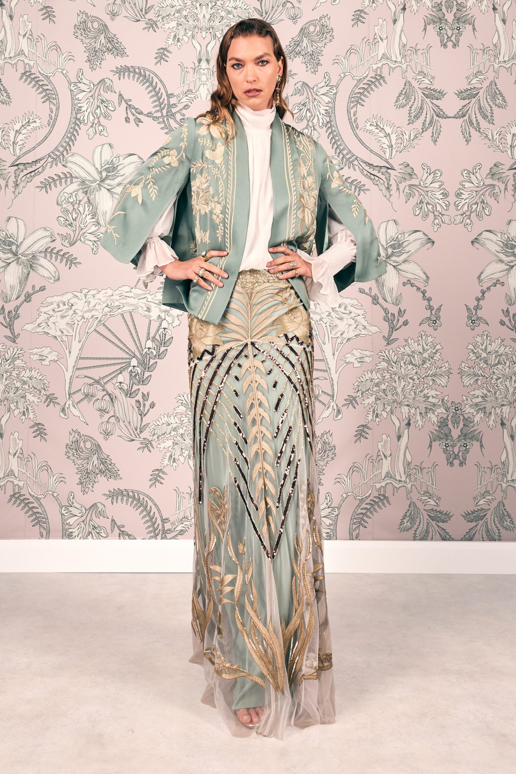 green embroidered jacket and skirt