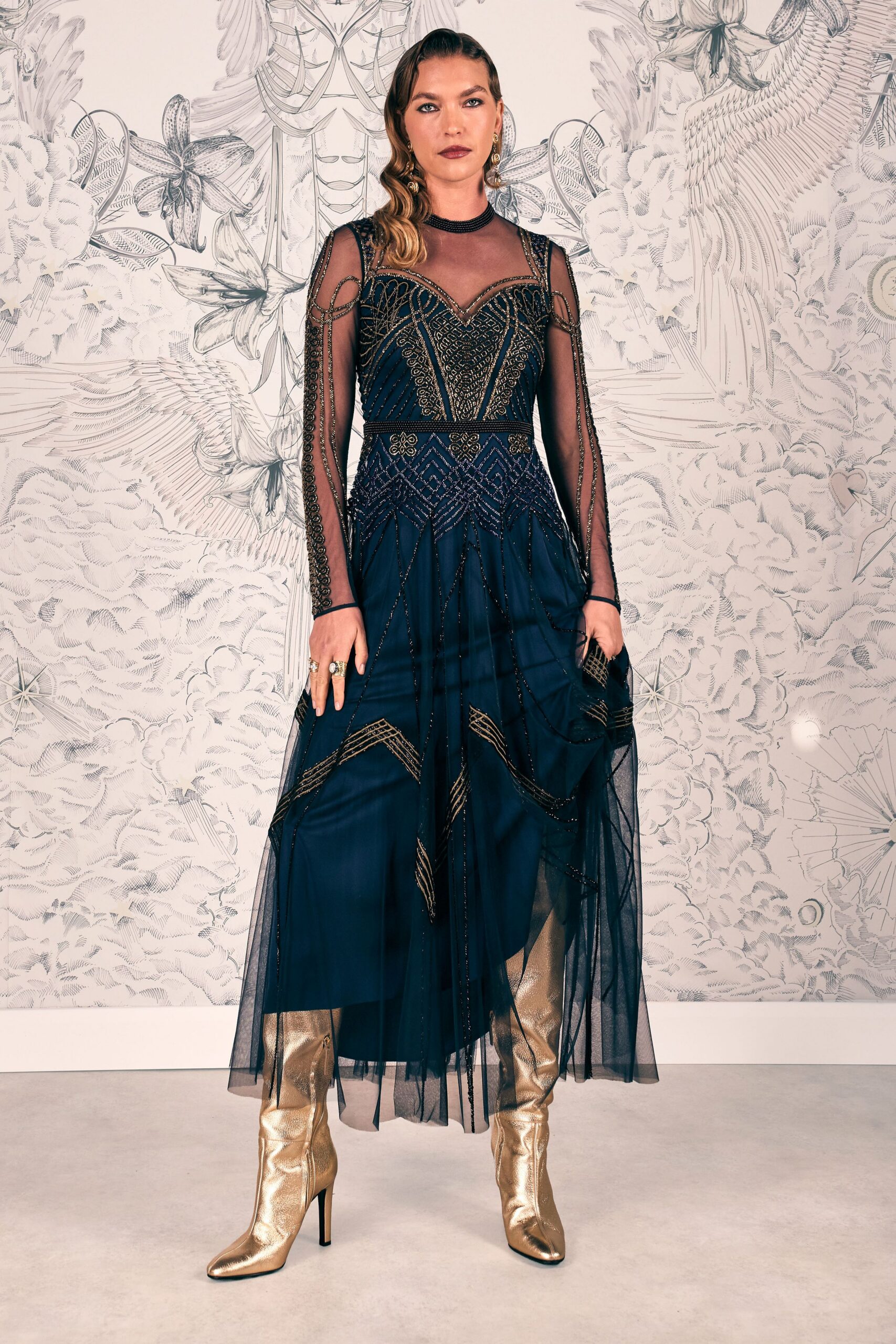 navy embroidered midi gown with gold boots