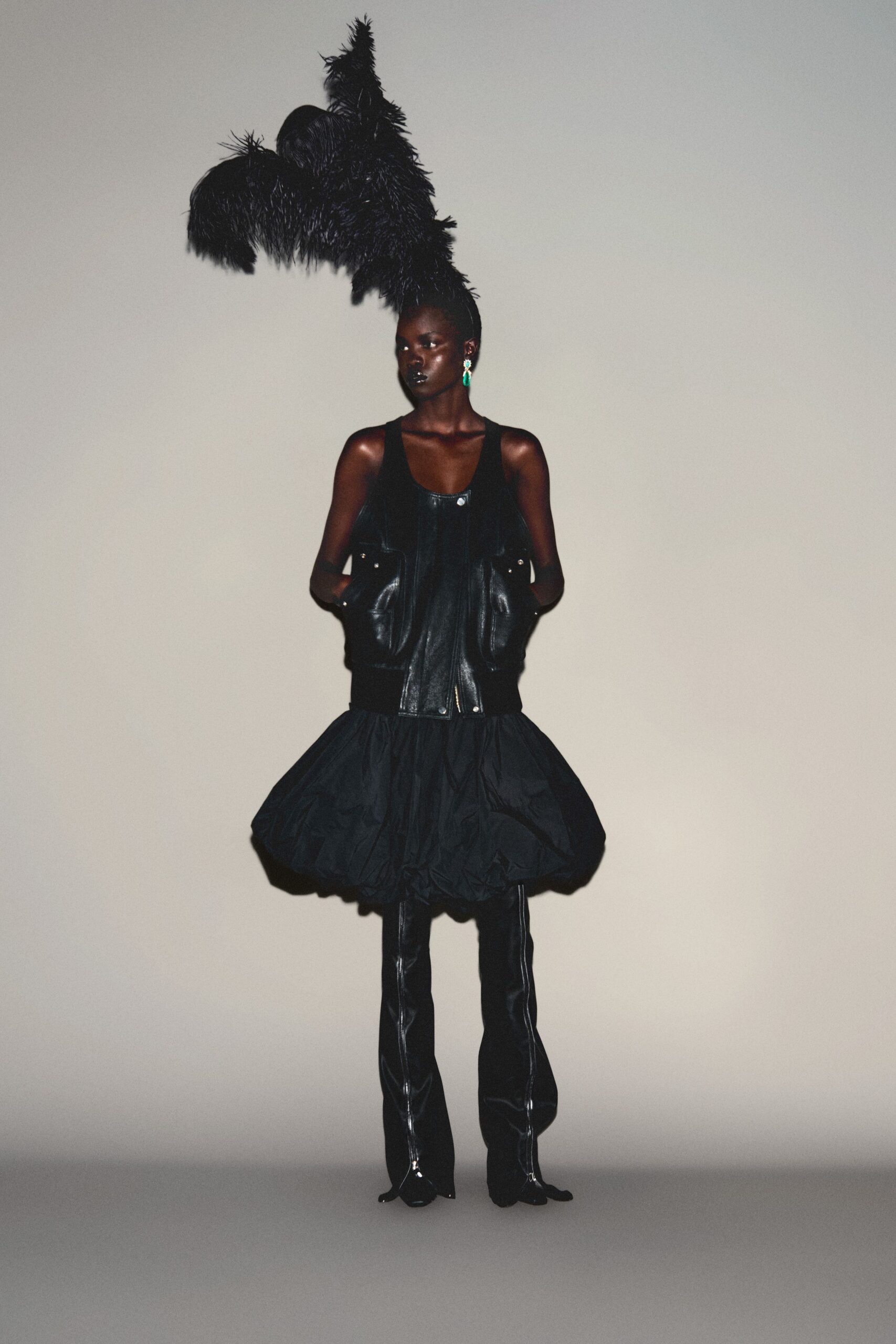 black feather structured fringed hat