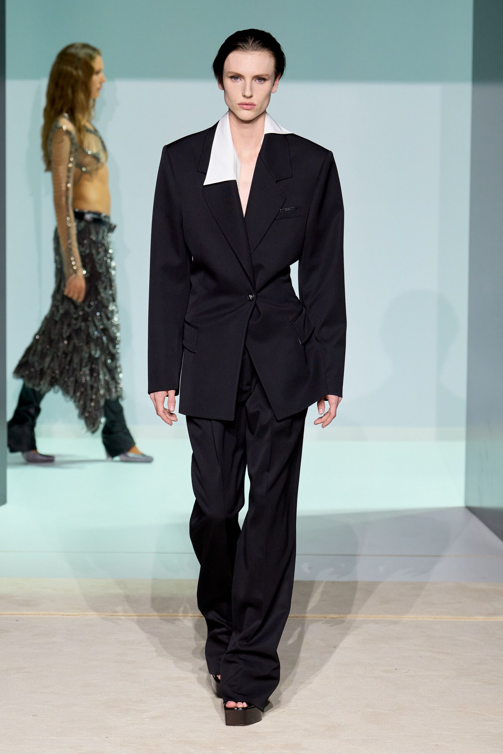 black wool long-sleeve collared tailored buttoned suit