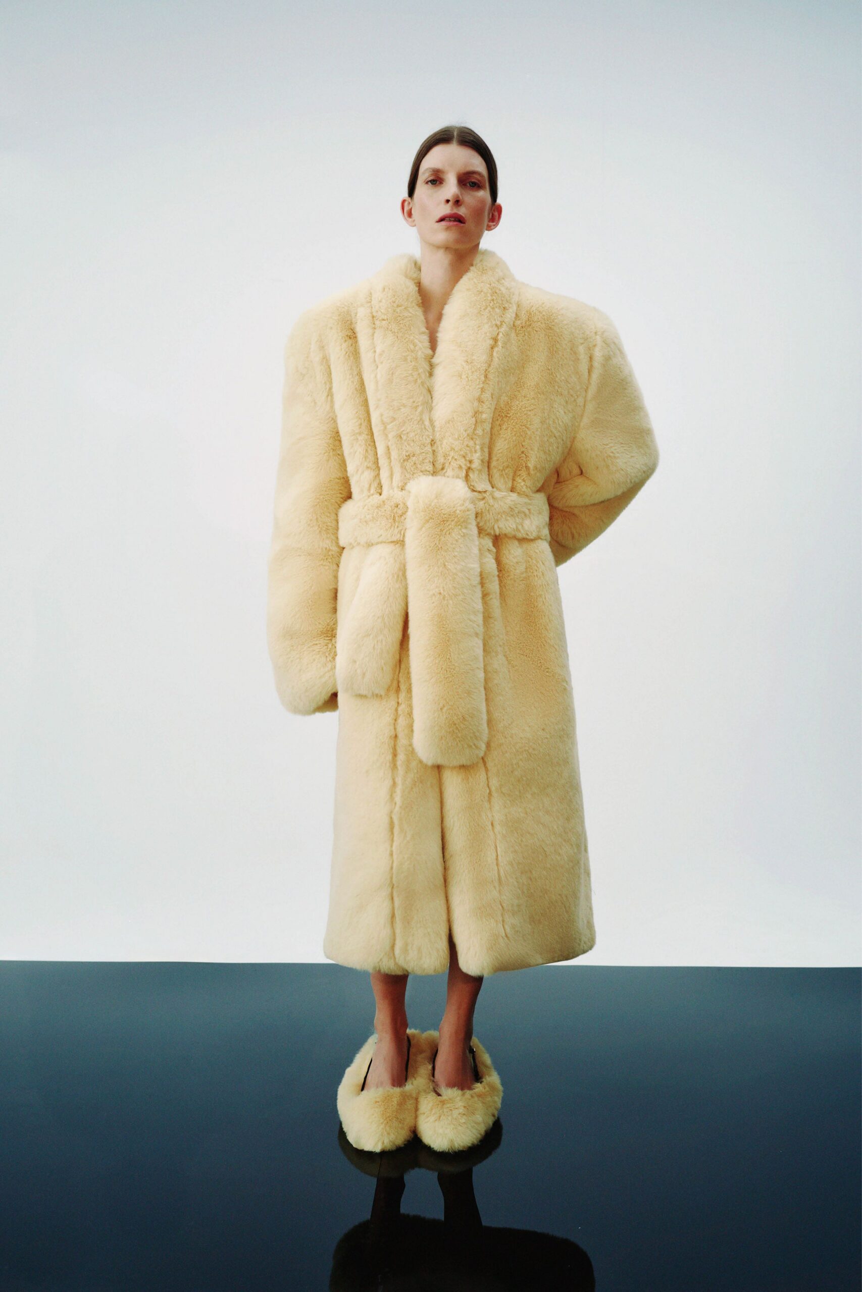 beige faux-fur coat and shoes