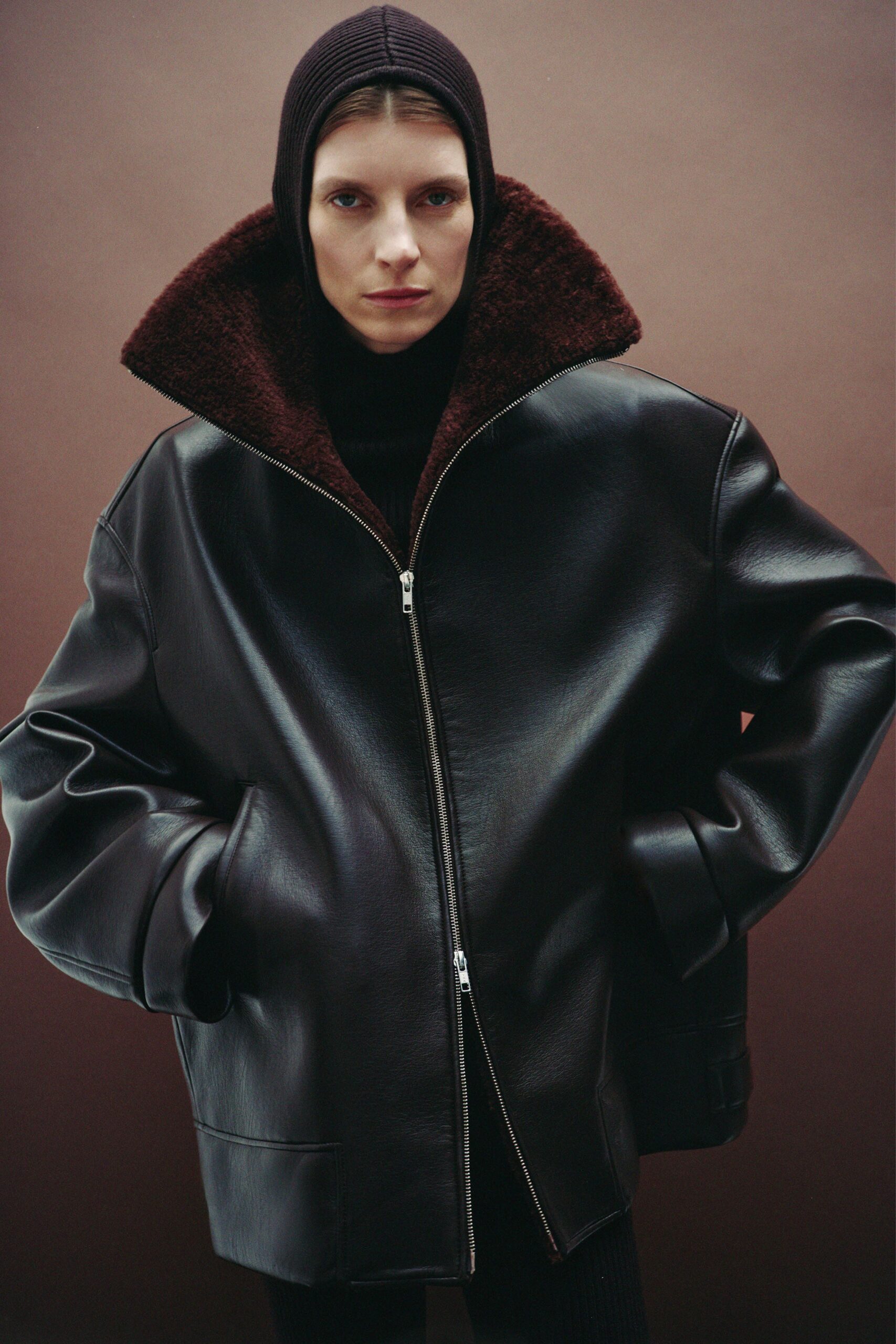 oversized black leather jacket with turtleneck
