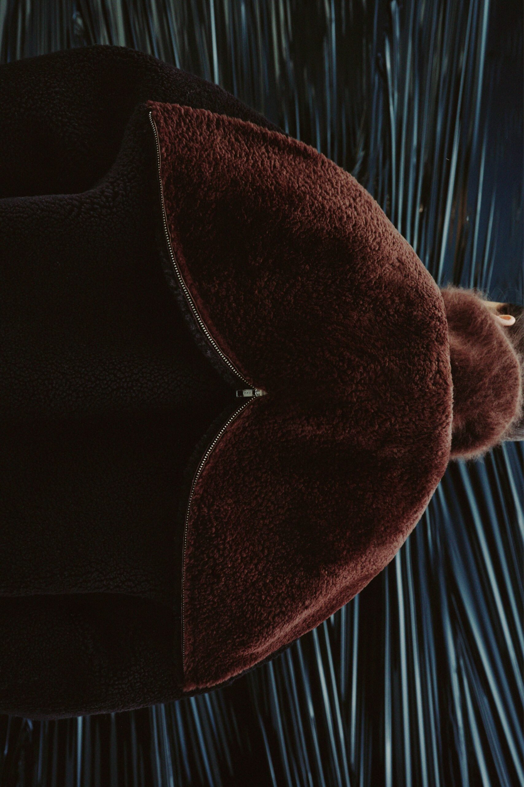 black and brown faux-fur coat