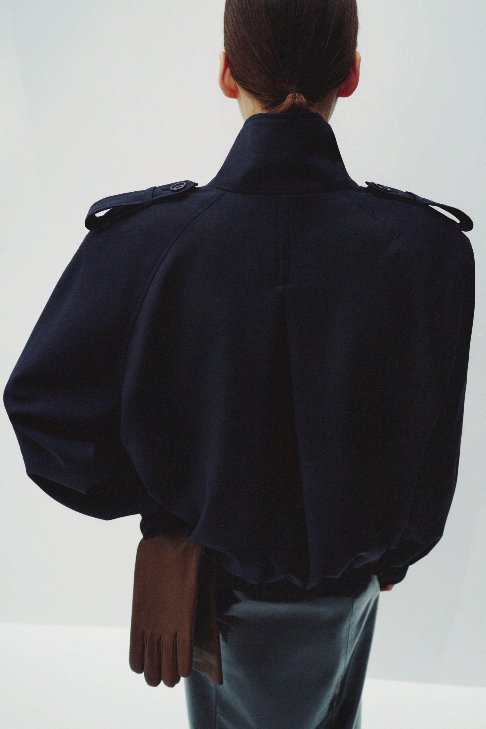 black relaxed jacket with leather skirt