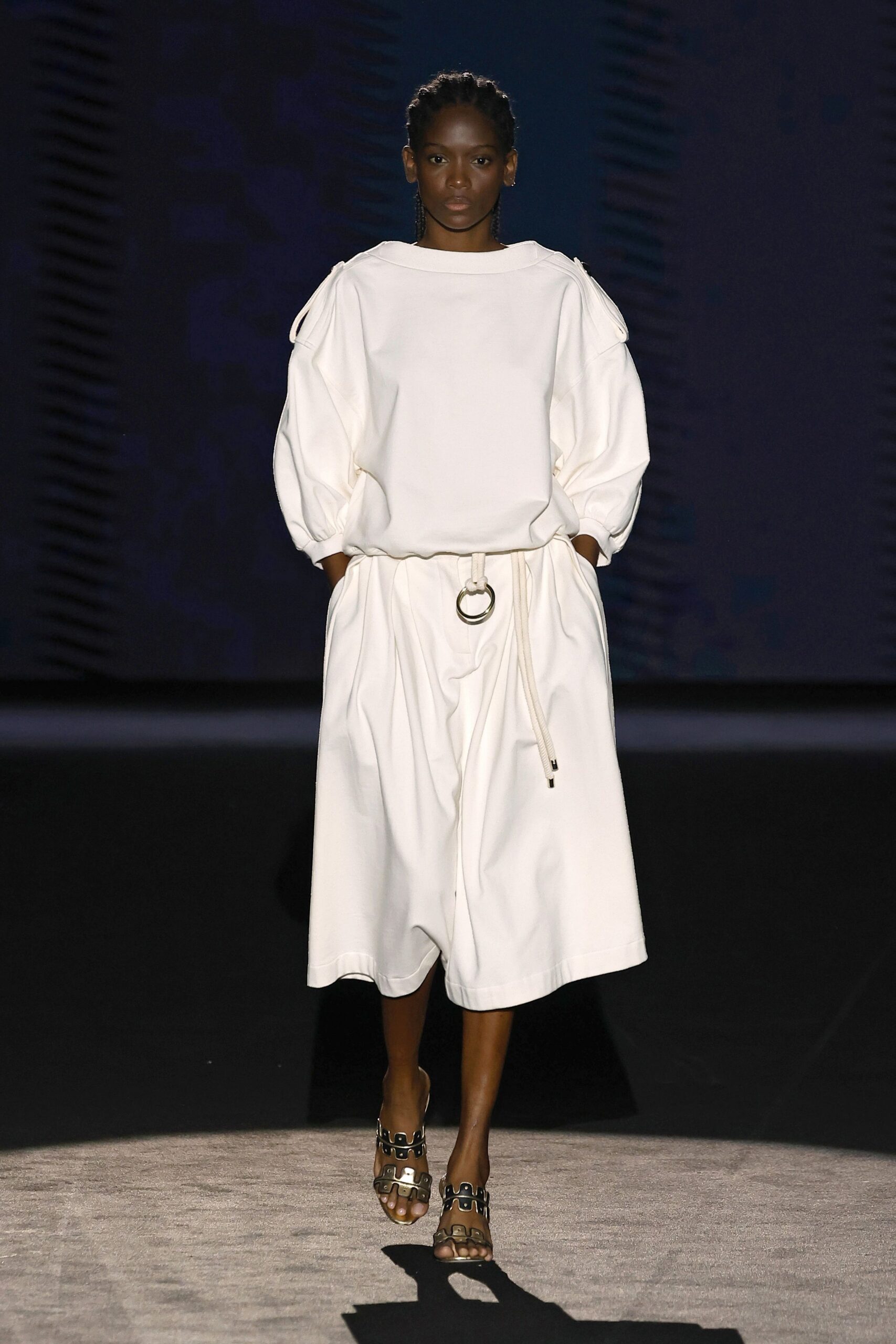white cotton long-sleeve collared relaxed pleated top