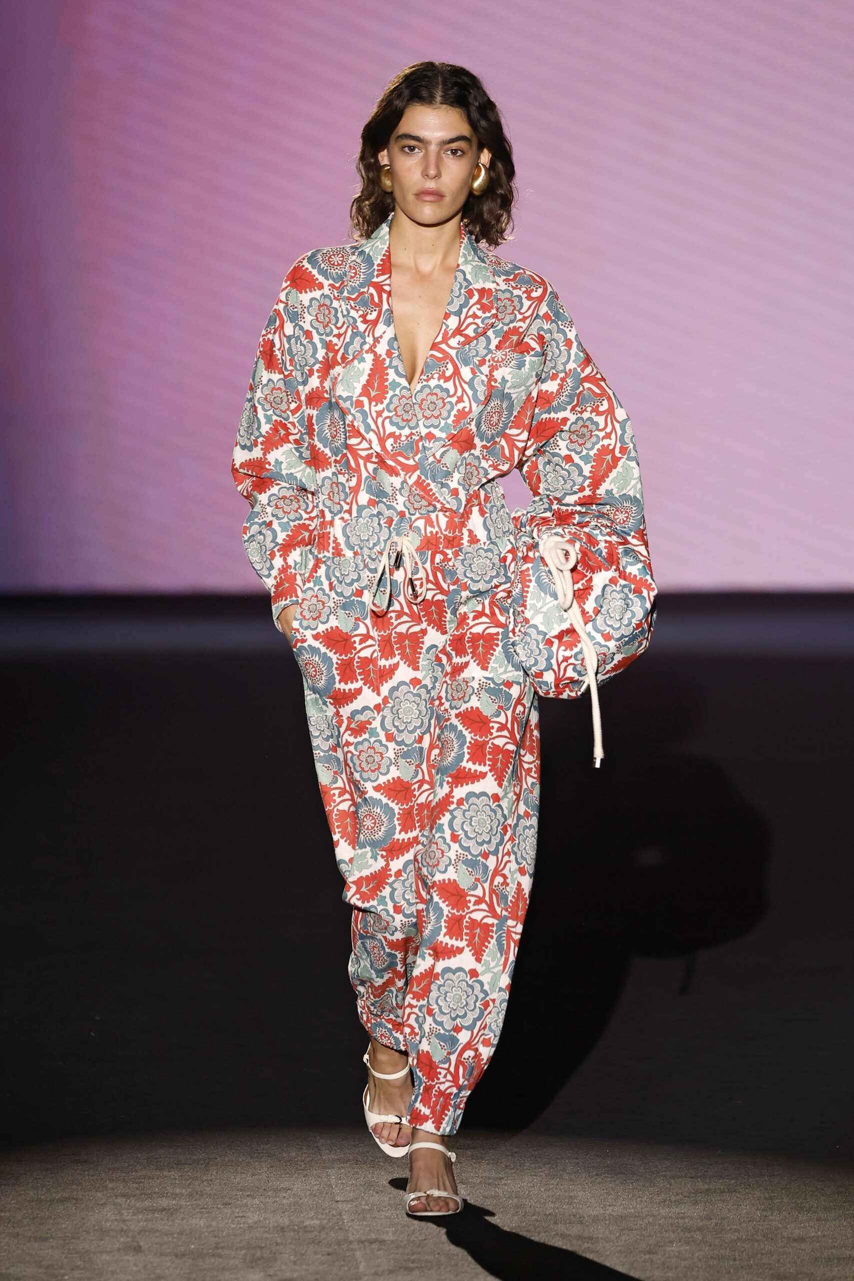 red cotton long-sleeve v-neck relaxed floral belted jumpsuit
