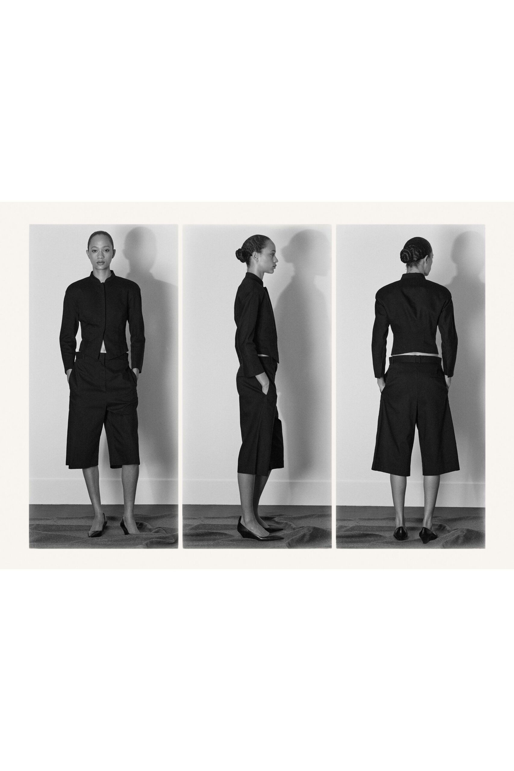 black cotton long-sleeve collared fitted buttoned blazer