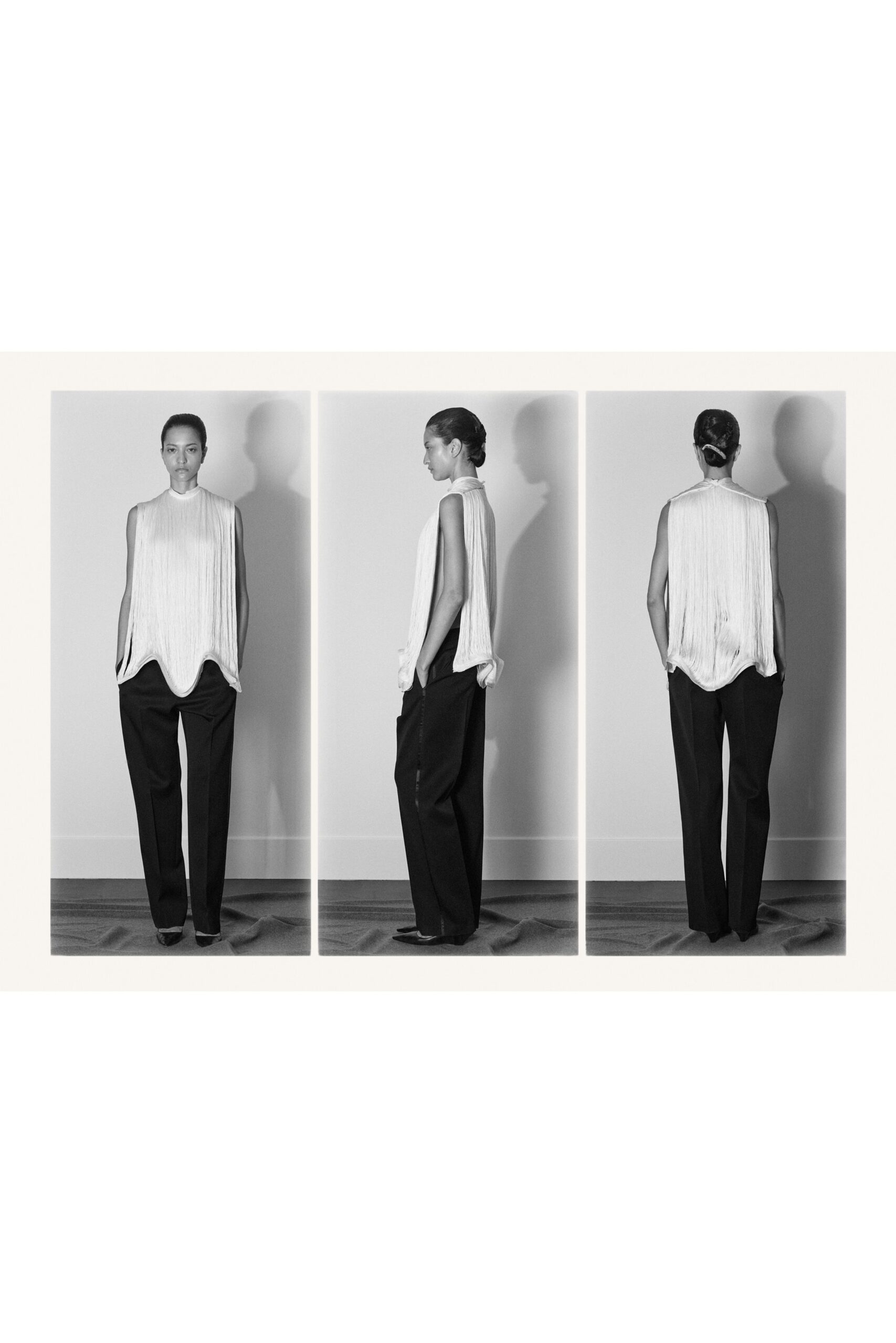 white silk sleeveless relaxed pleated flowing top