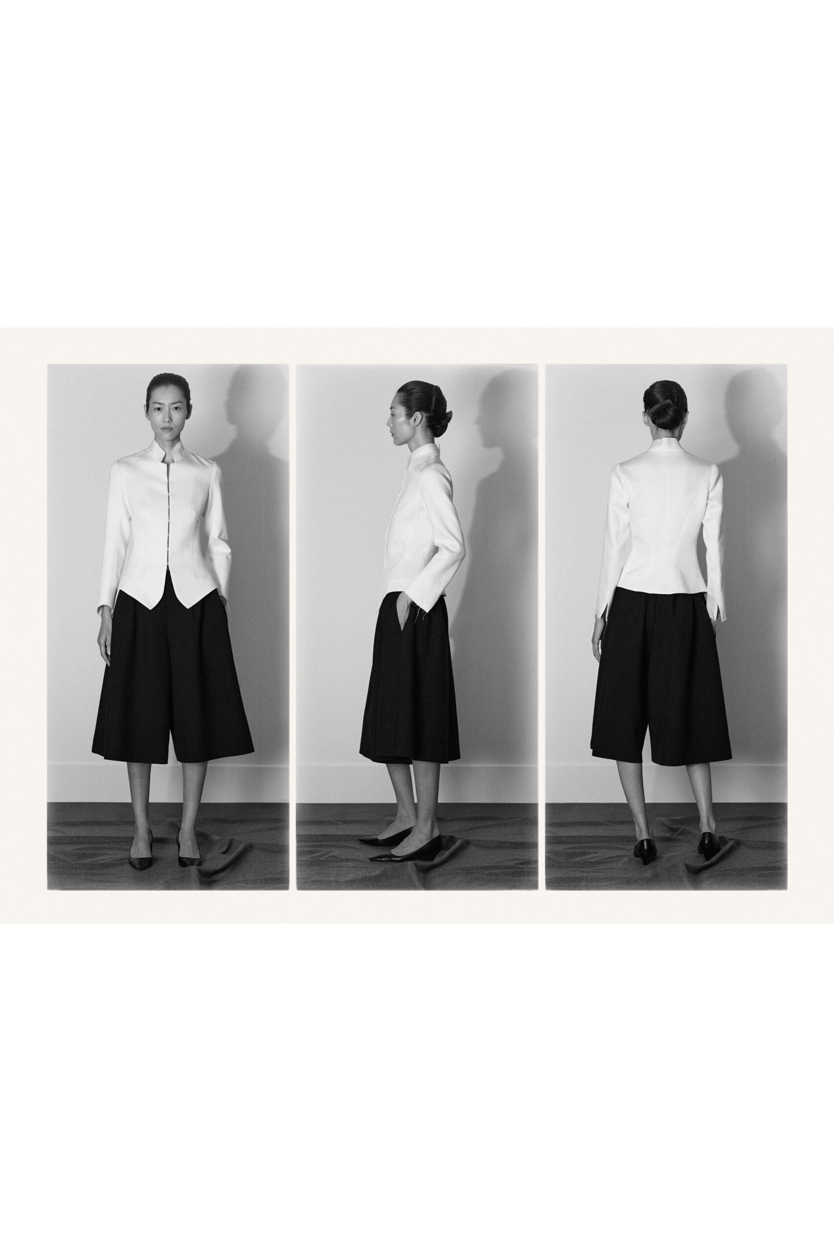 white silk long-sleeve collared structured buttoned blazer