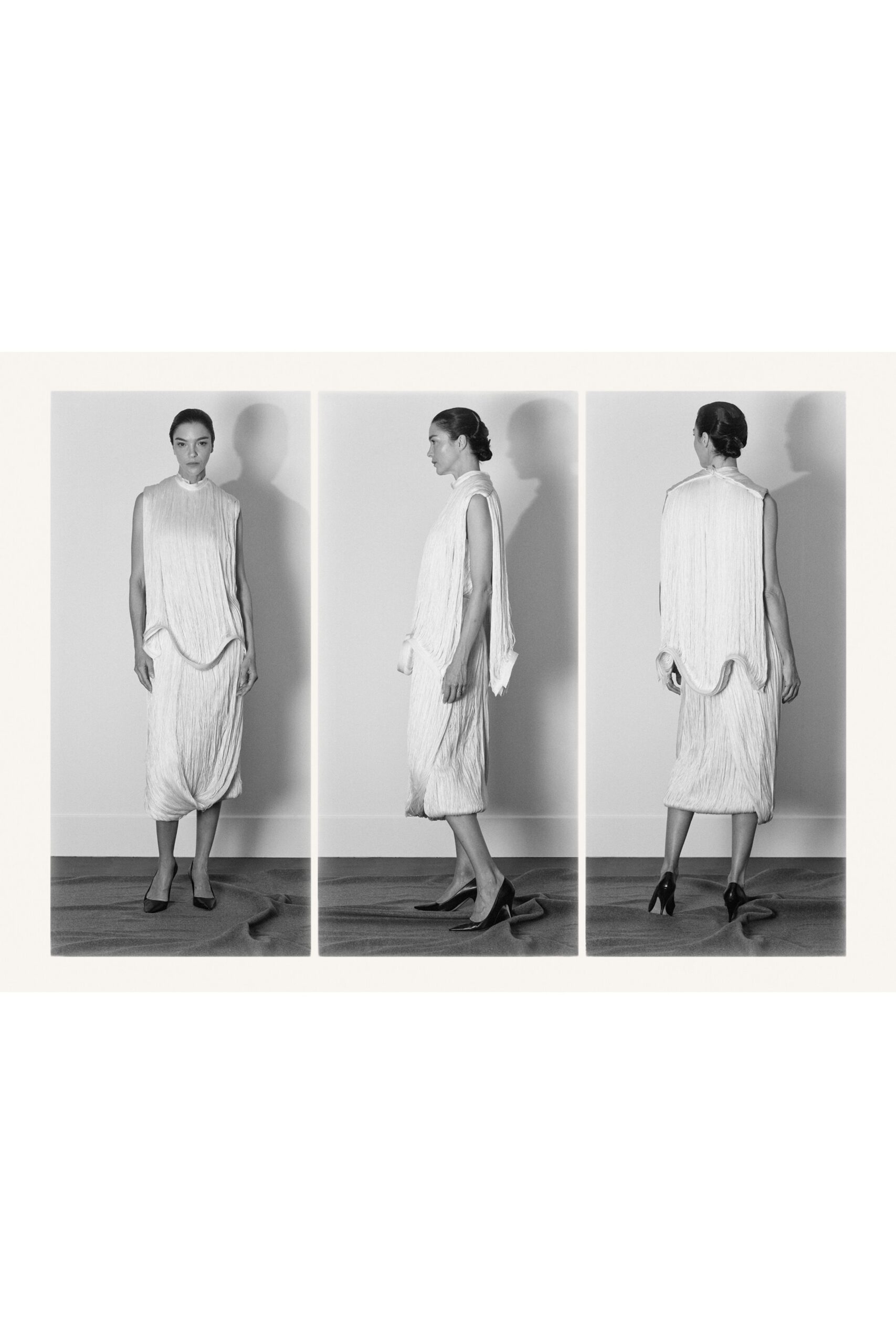 white silk sleeveless high-neck relaxed pleated midi dress
