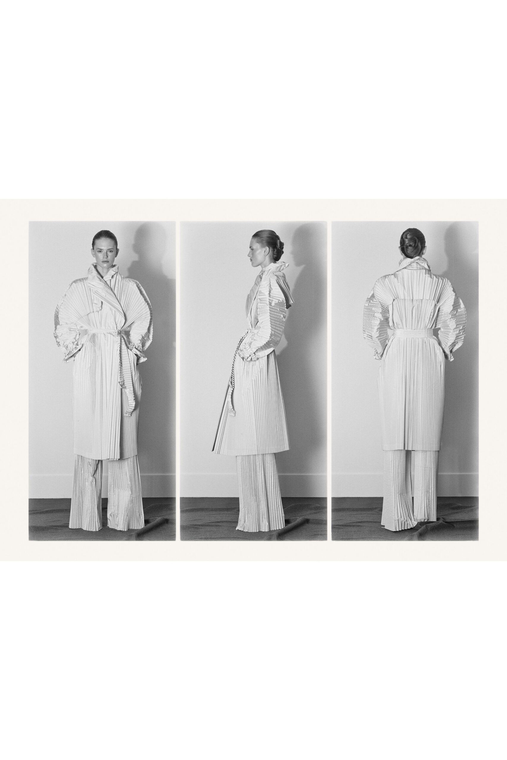 white cotton long-sleeve collared fitted pleated belted coat