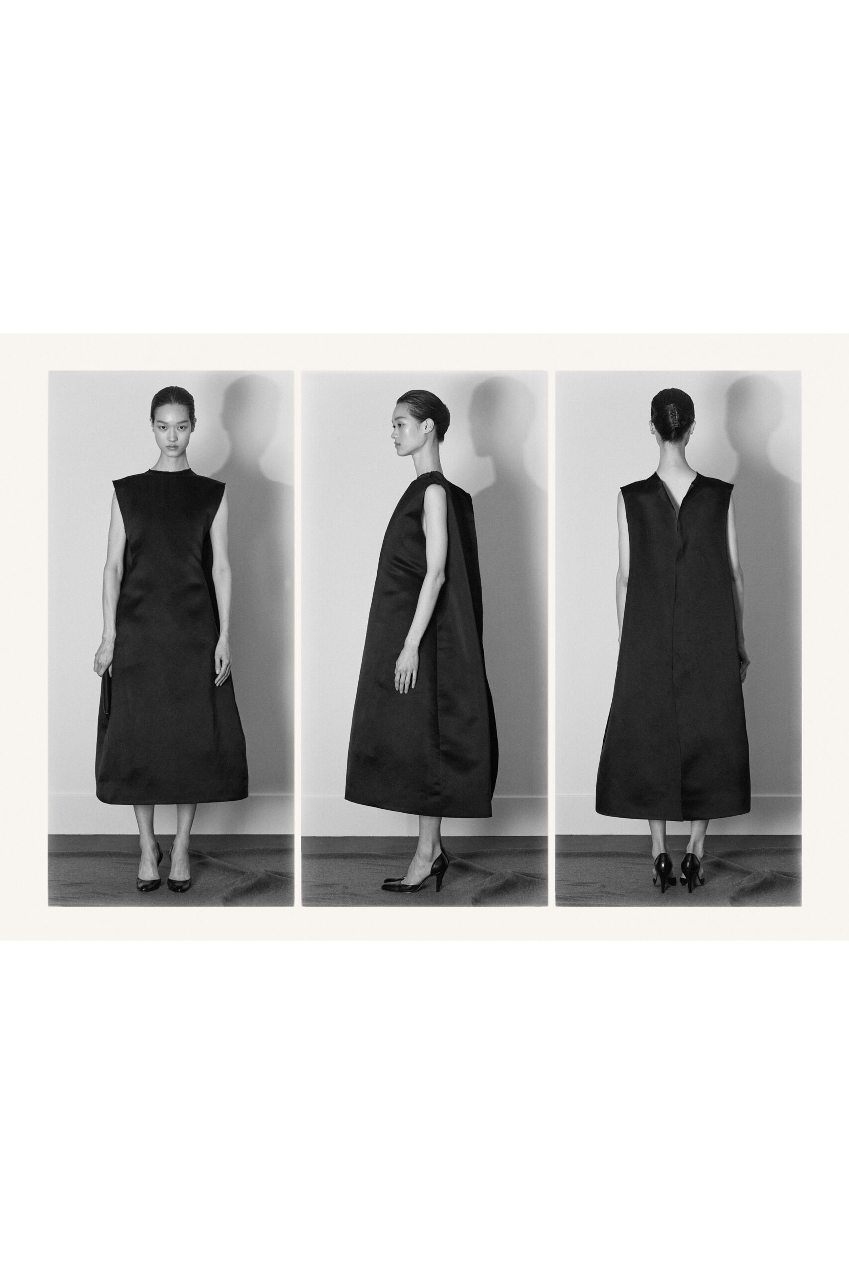 black silk sleeveless high-neck relaxed a-line midi dress
