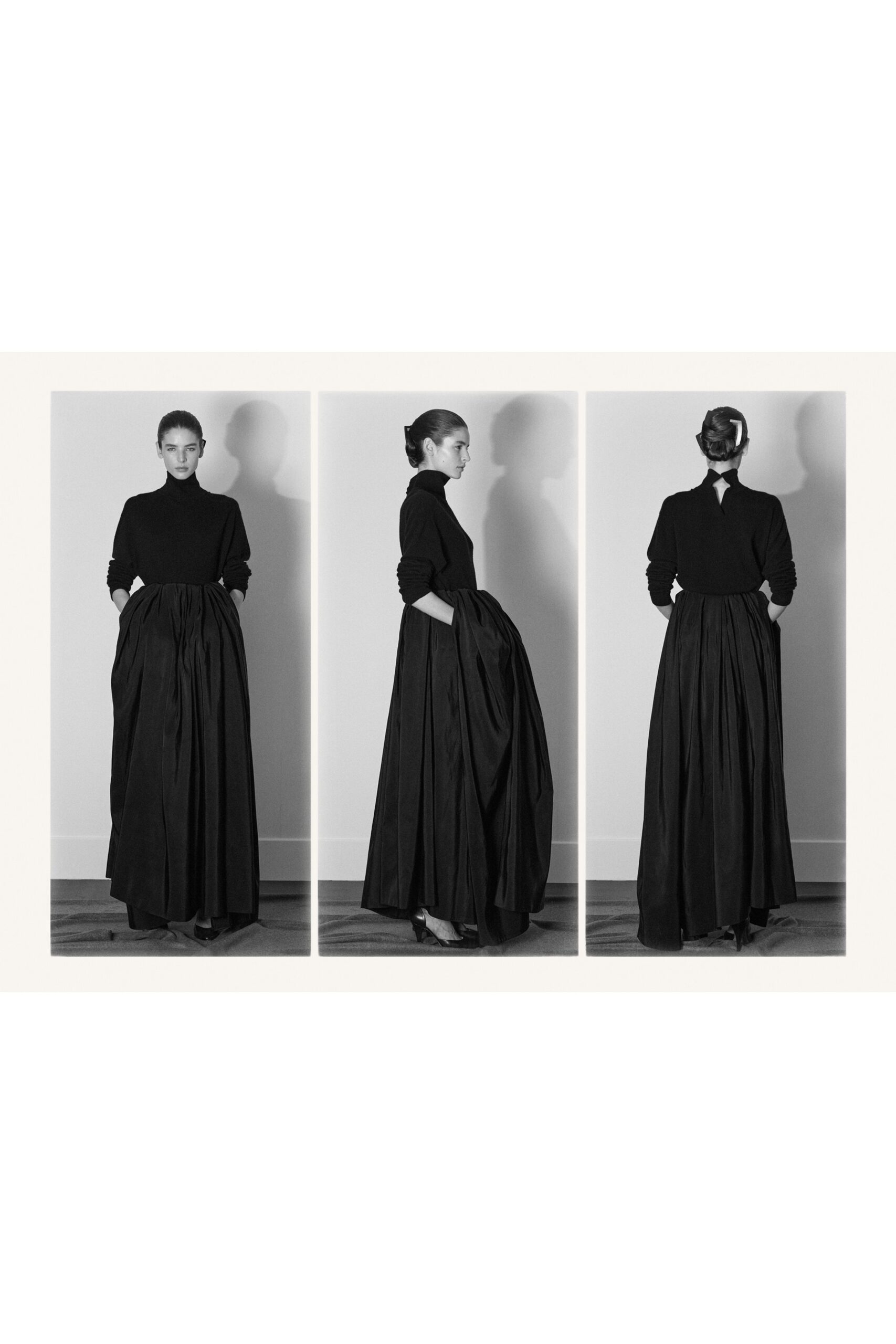 black silk fitted high-waisted pleated flowing maxi skirt