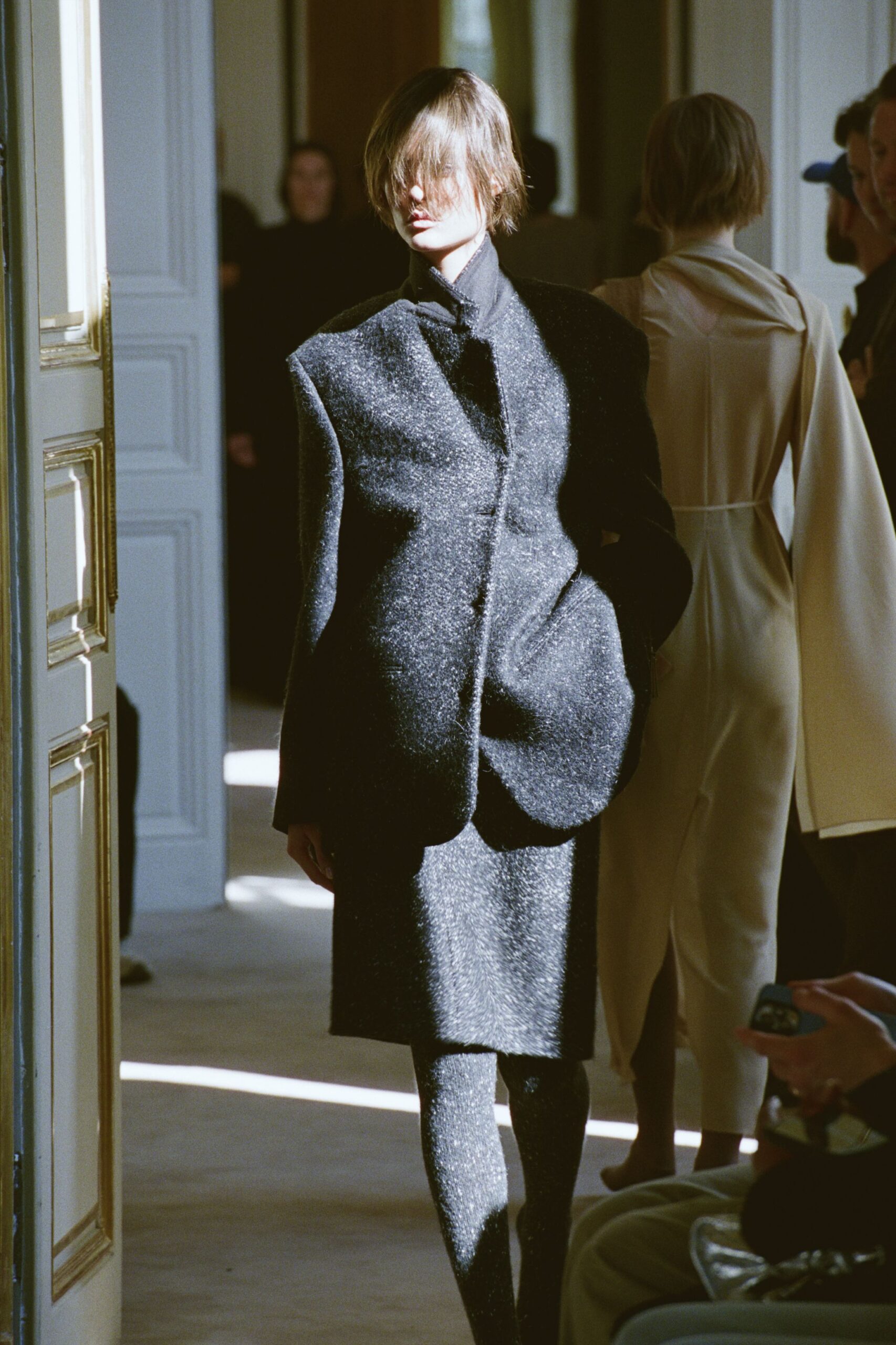 black wool long-sleeve collared structured textured shiny blazer