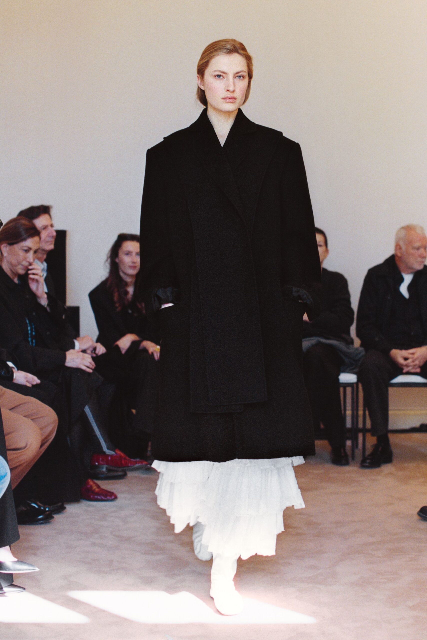 black wool long-sleeve collared oversized buttoned coat