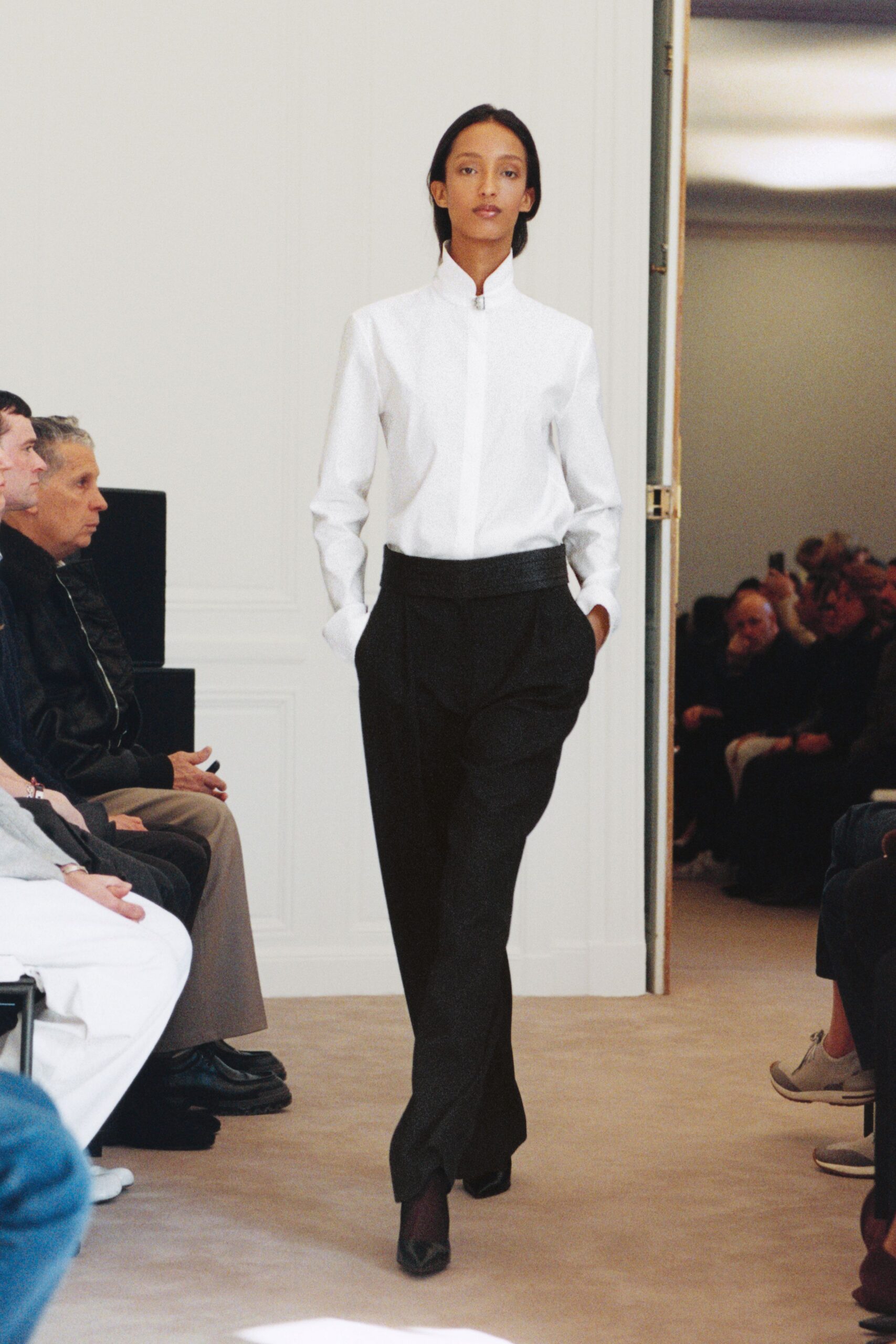 white fitted shirt black relaxed pants