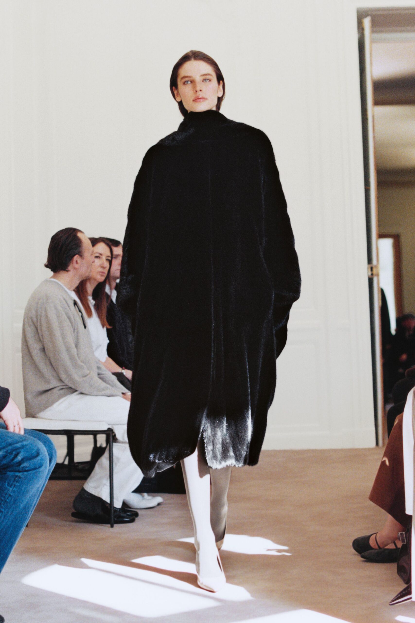black fur long-sleeve high-neck relaxed textured flowing coat