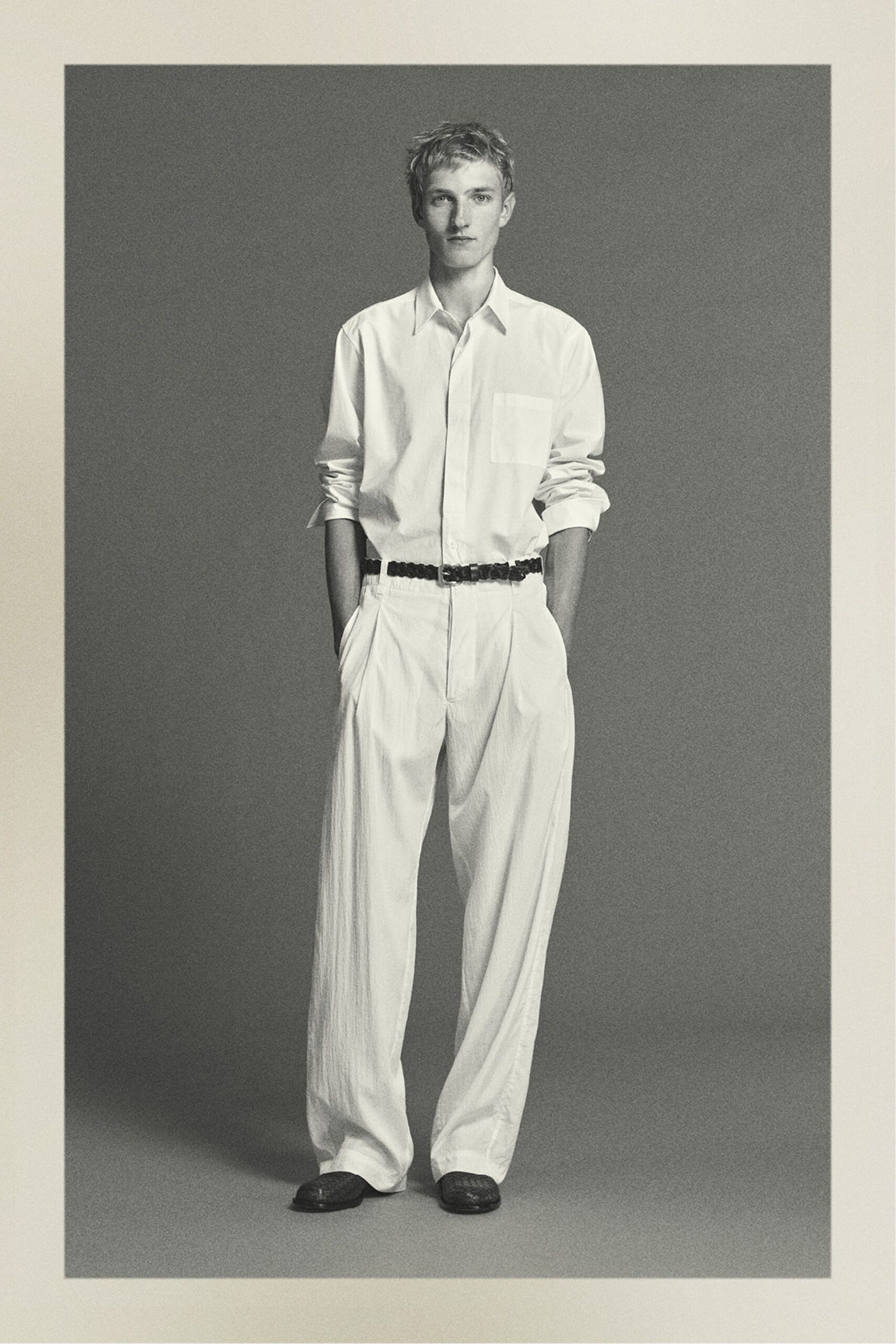 white cotton relaxed pleated pants