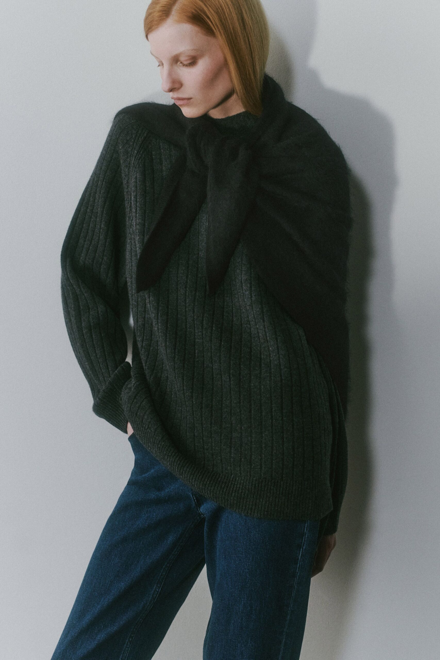 black wool long-sleeve collared relaxed ribbed sweater