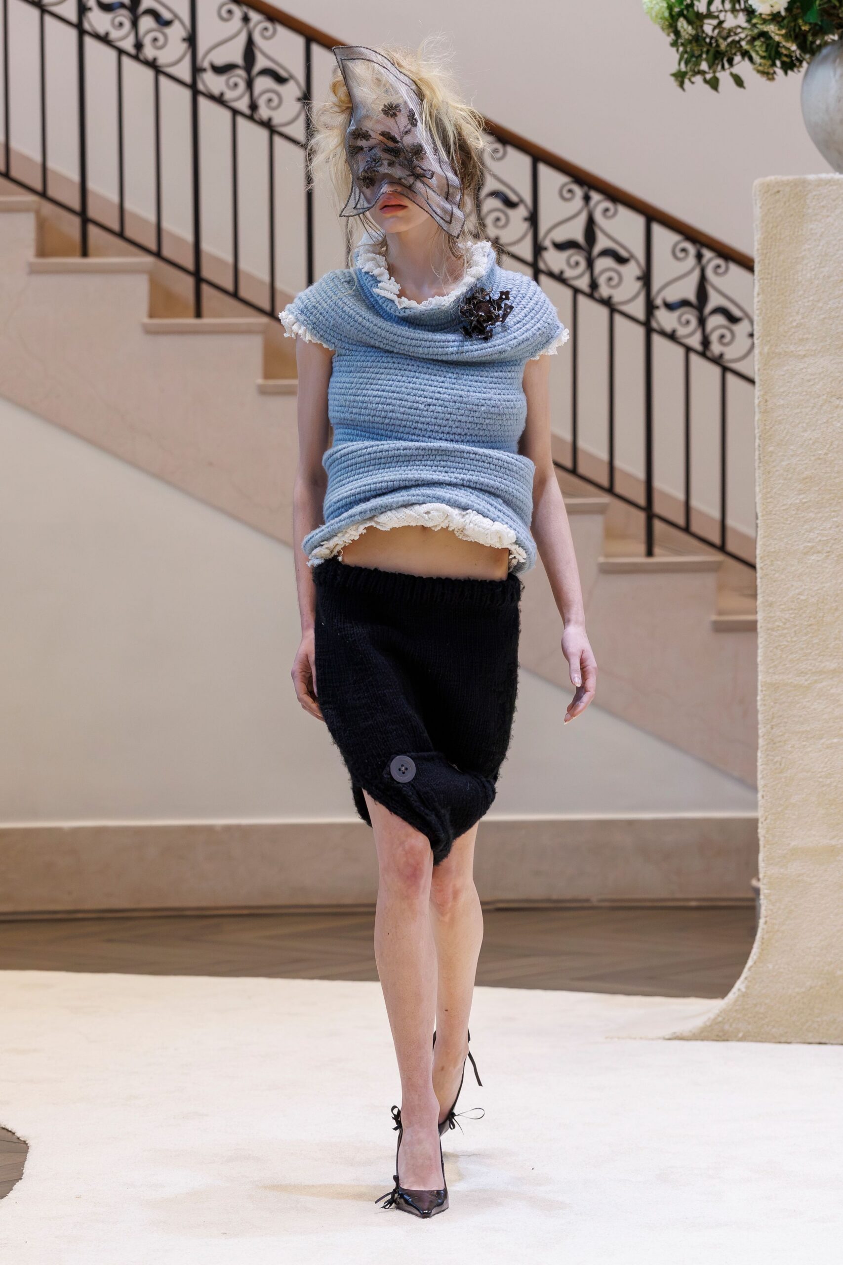 blue fitted top black skirt