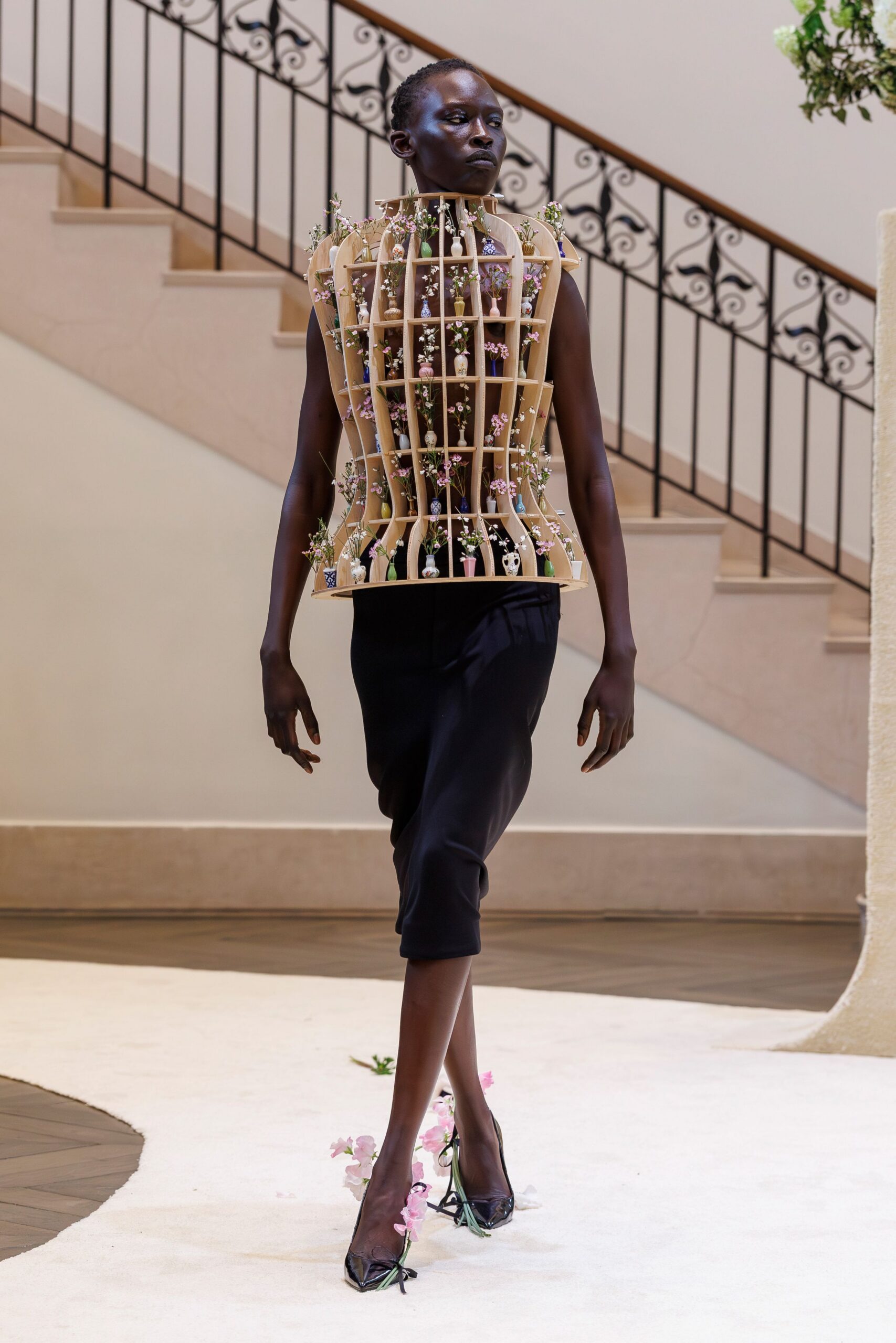 structured beige top black midi skirt
