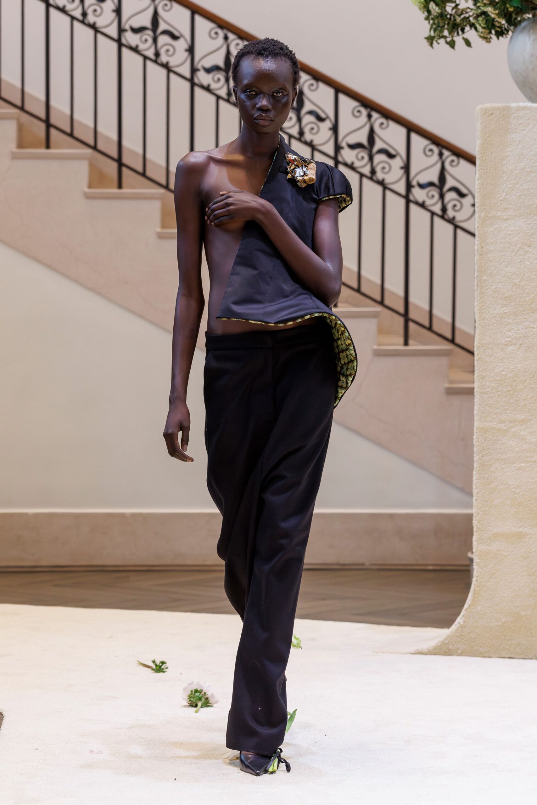 black silk asymmetric top and relaxed pants