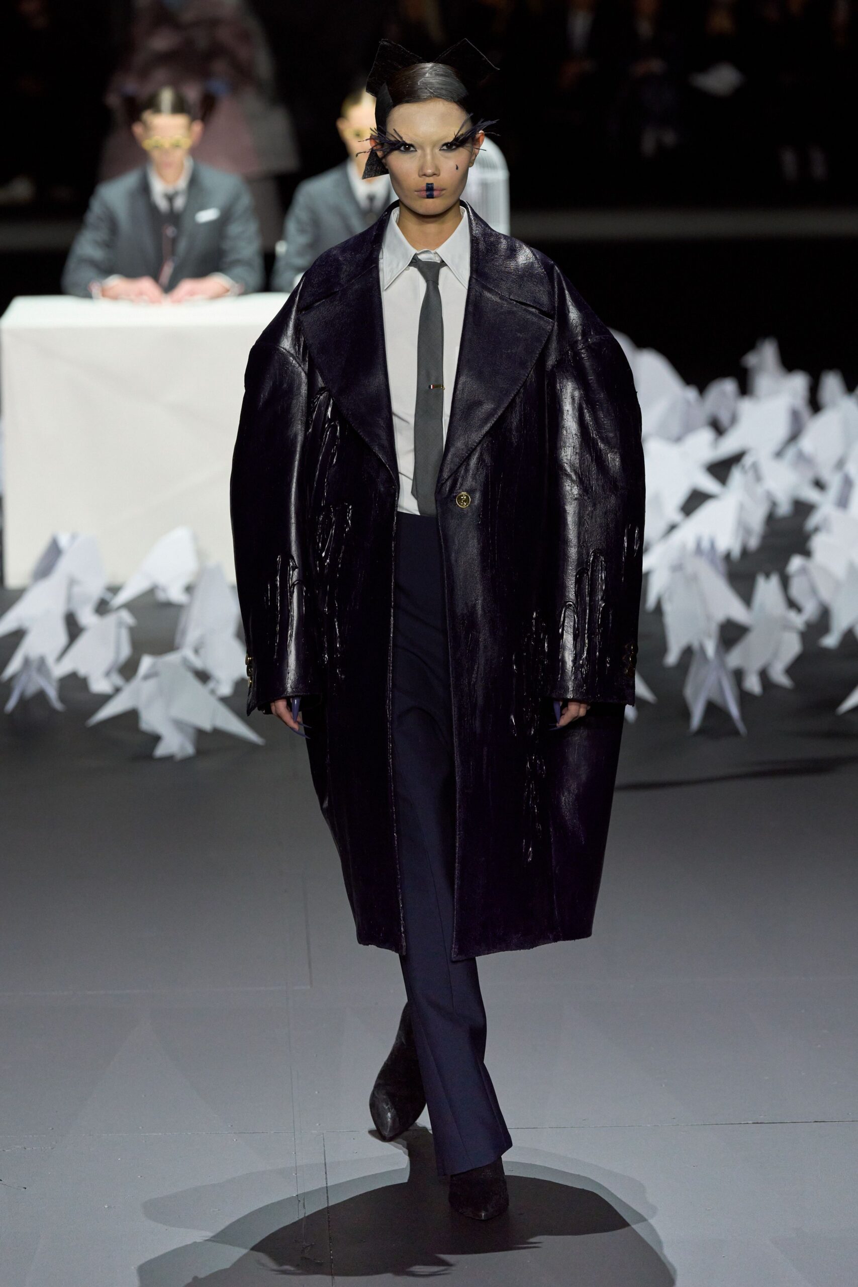 oversized black leather coat with shirt and tailored pants